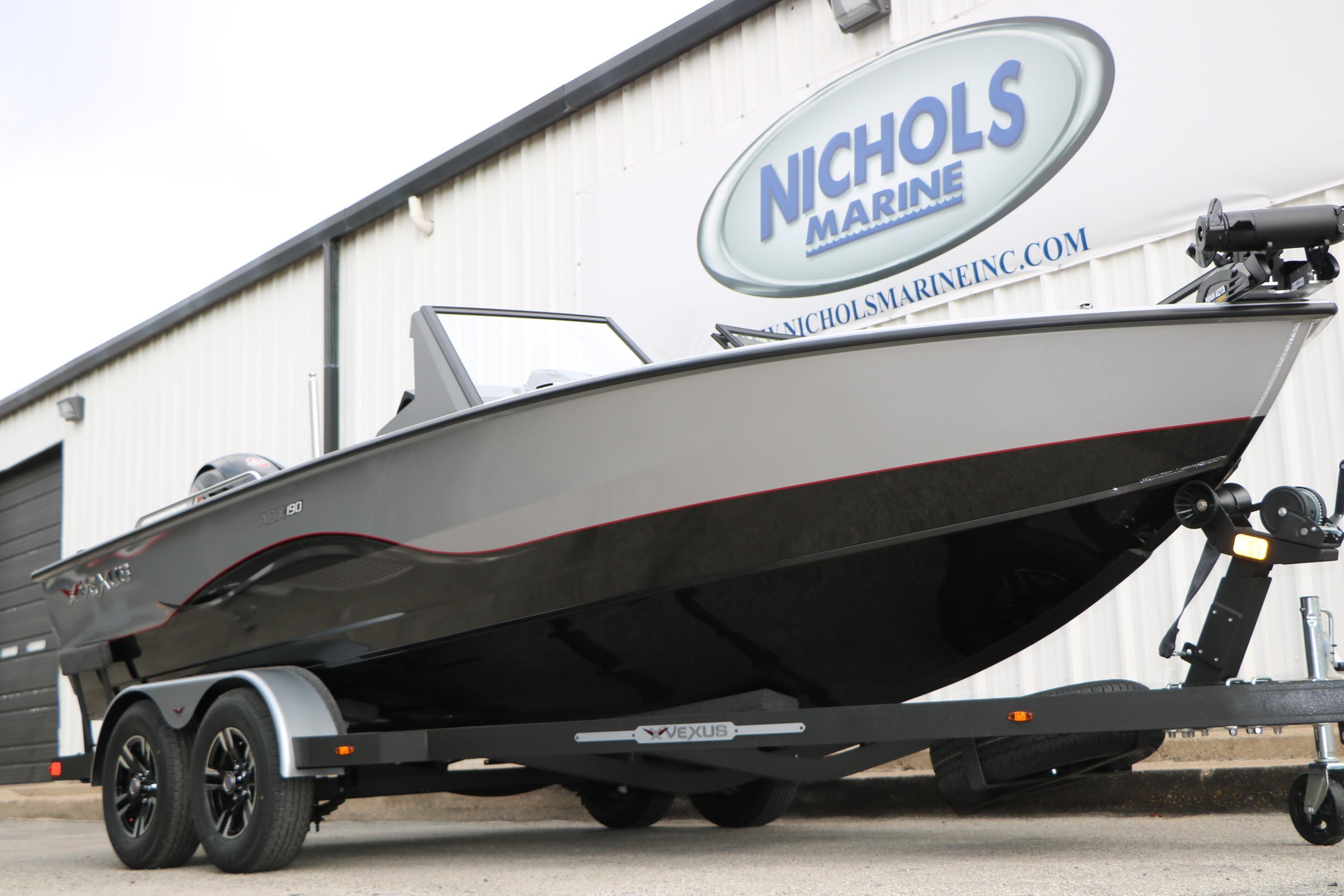 2026 Vexus ADX 190 boat on trailer at Nichols Marine dealership.