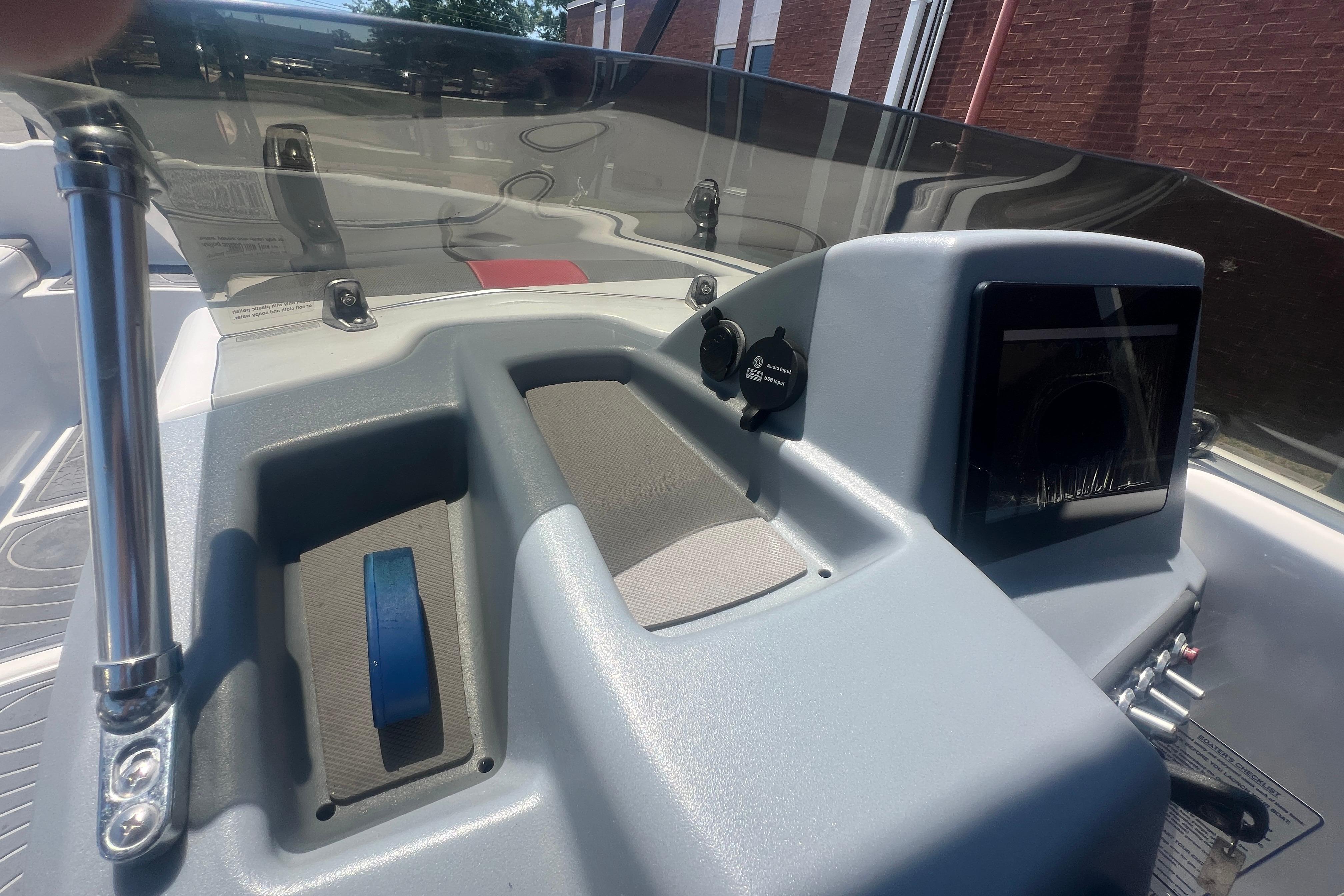 2023 Tahoe T16 boat dashboard with modern controls and sleek design.