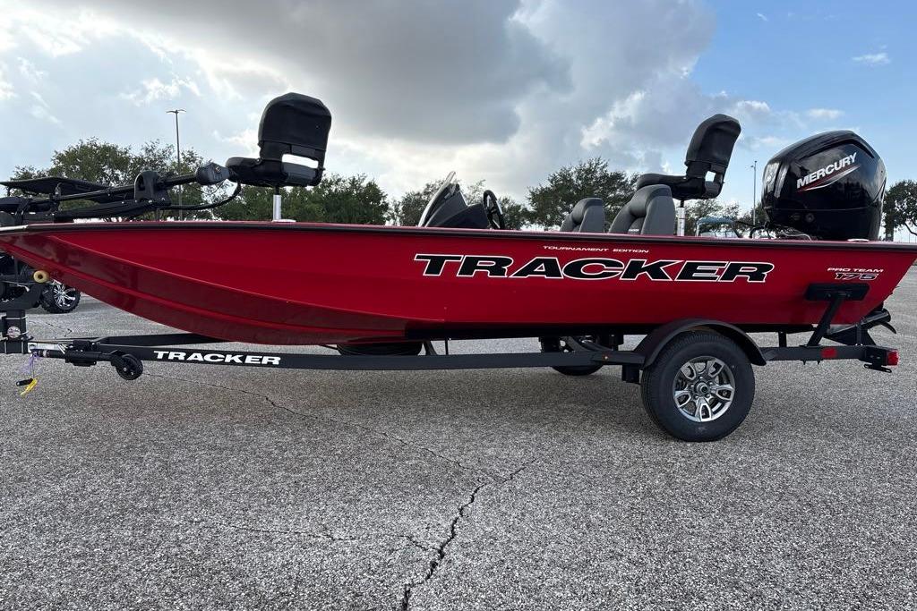 2026 Tracker Pro Team 175 boat in vibrant red on a trailer.