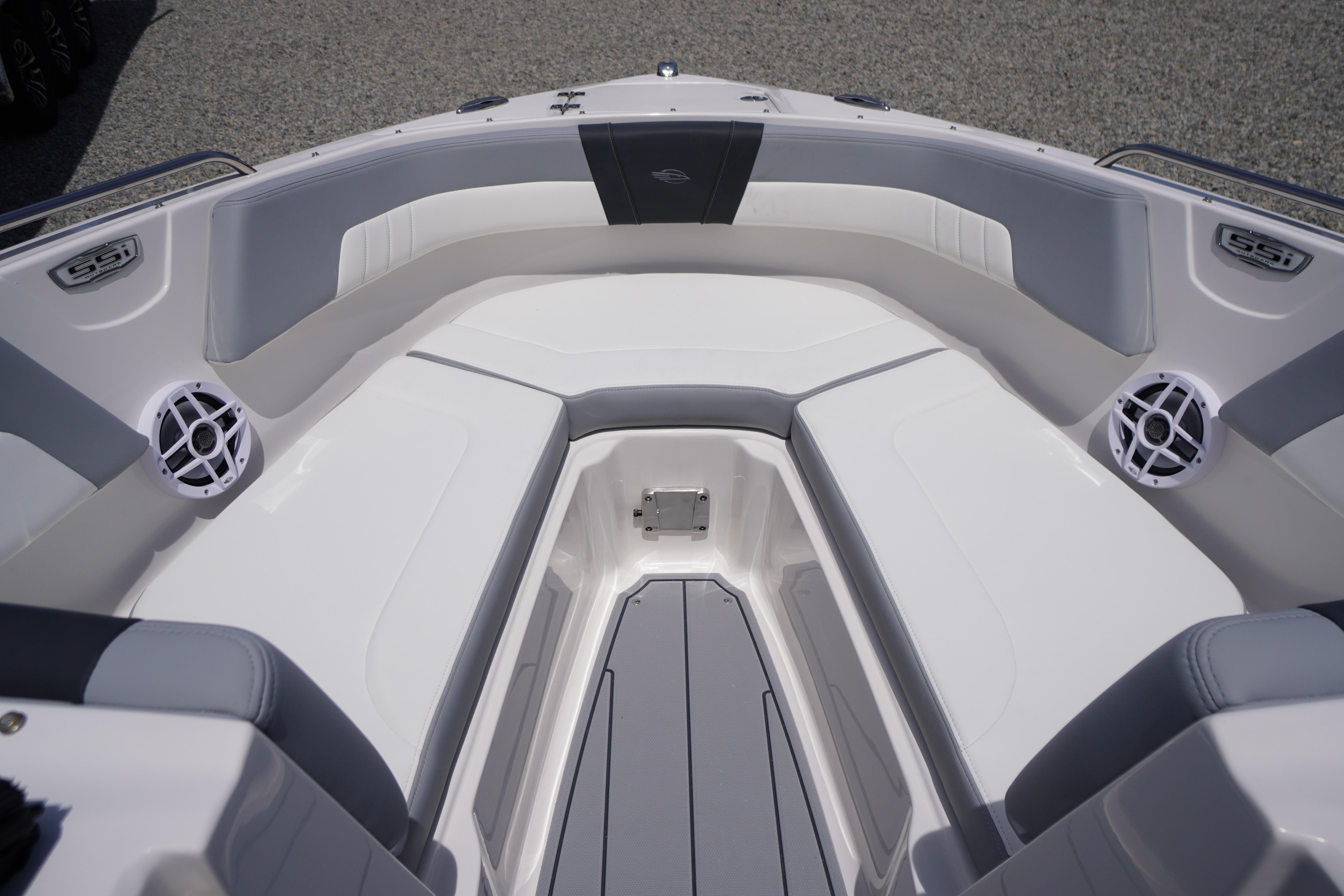 2026 Chaparral 23 SSi OB boat interior with gray and white seating.