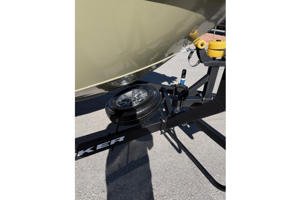 2026 Tracker Targa V-19 WT boat trailer with spare tire and hitch detail.