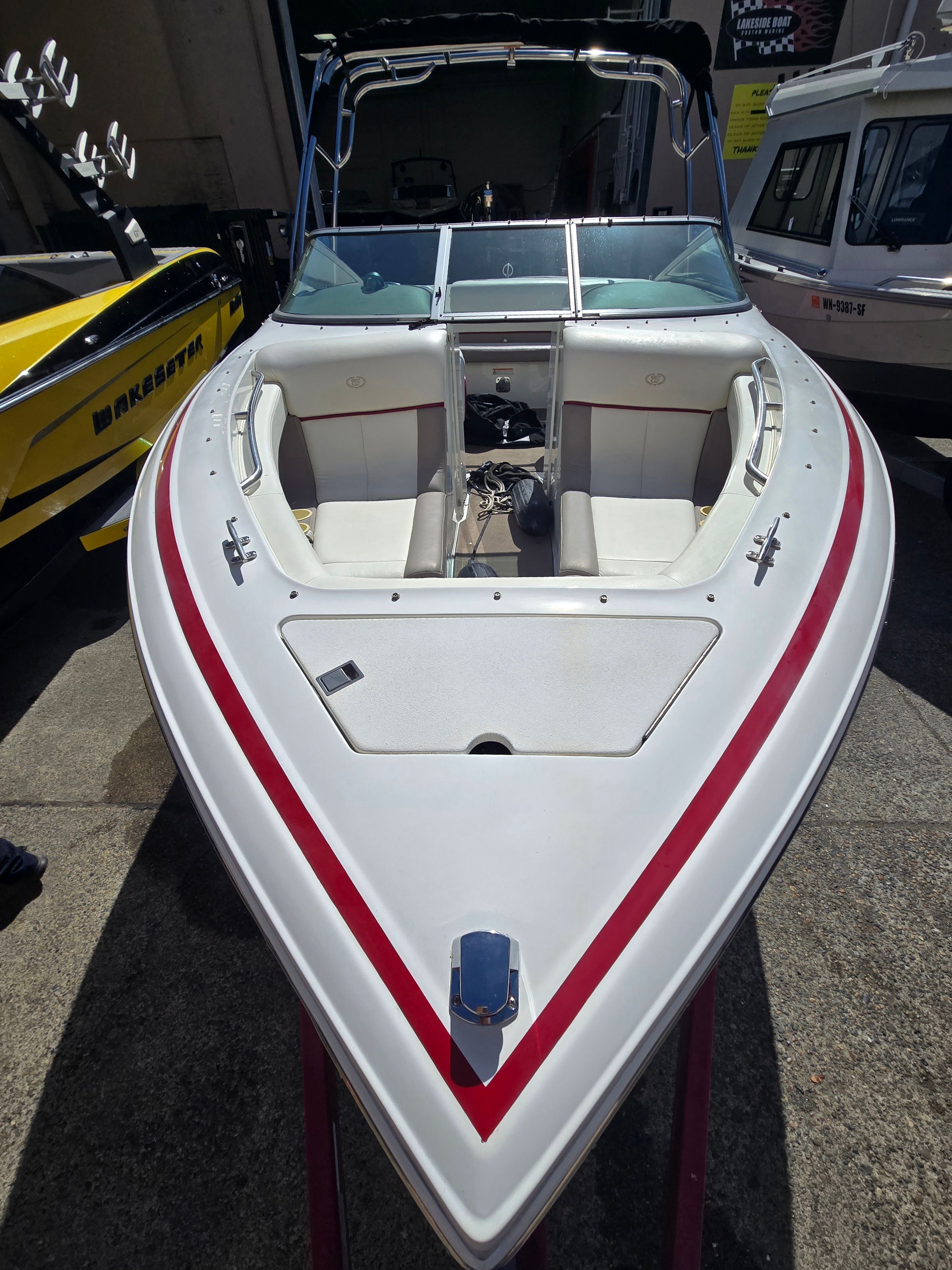 2001 Cobalt 226 boat with red stripe, front view.