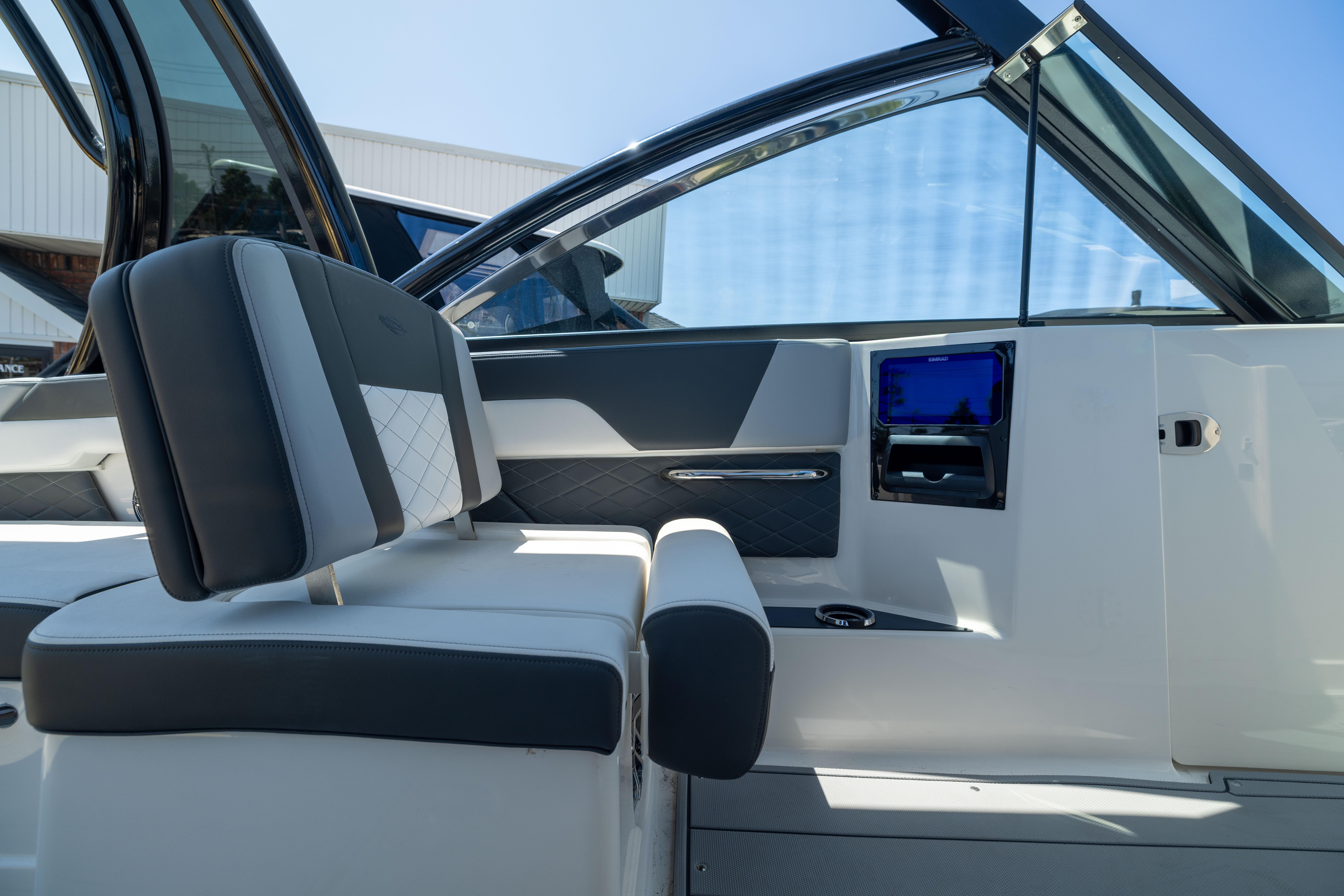 Interior of 2026 Chaparral 310 OSX boat, featuring sleek seating and modern design elements.