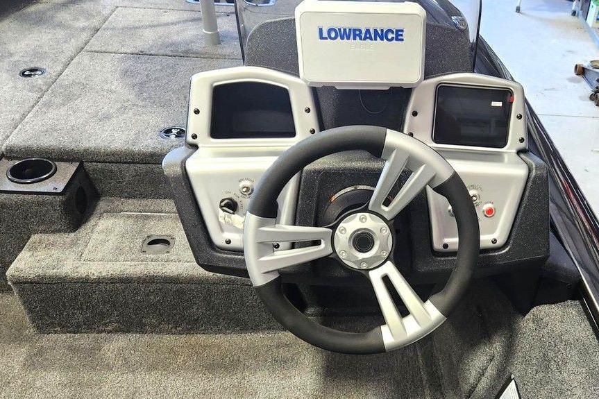 Steering console of 2026 Tracker Pro Team 175 boat with Lowrance electronics.