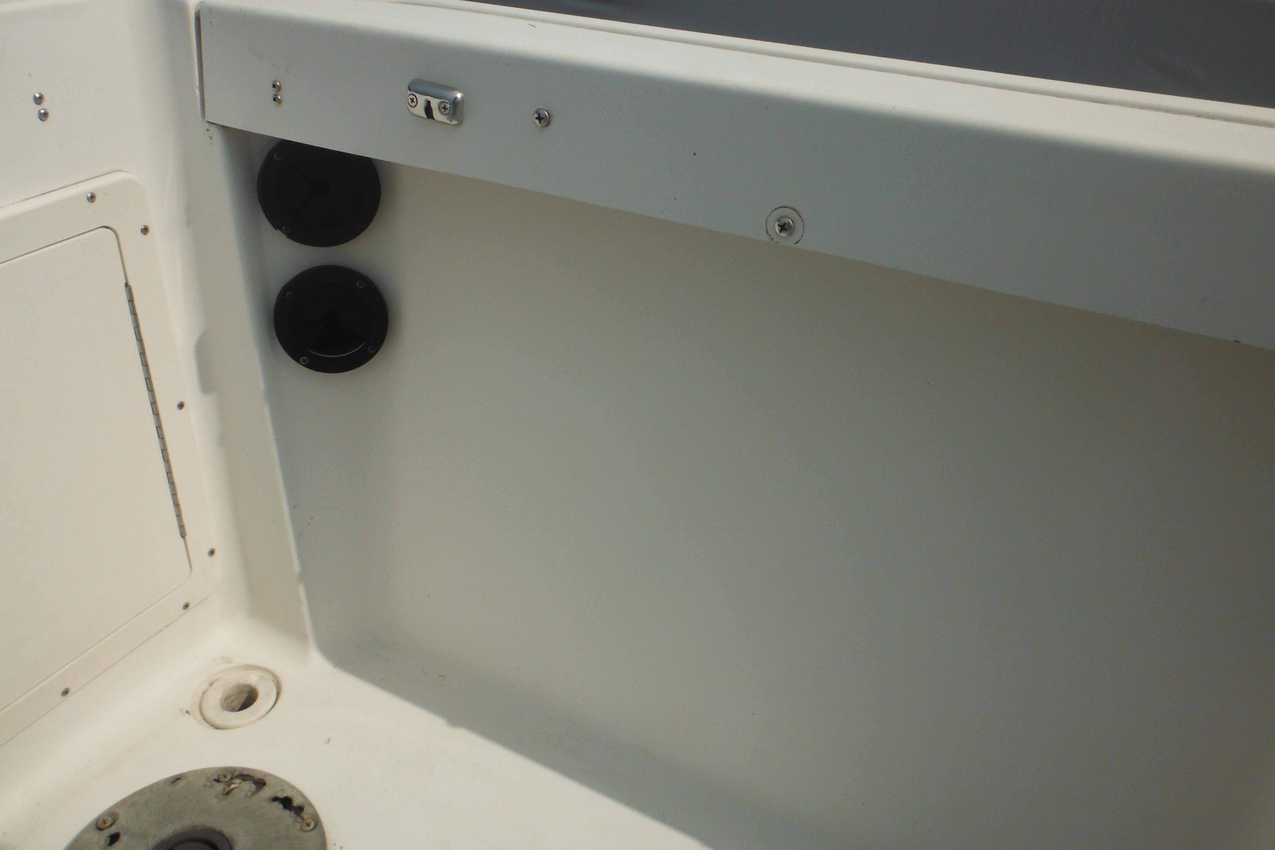 Interior view of a 2005 Seaswirl Striper 2101 Walkaround O/B boat, showing deck details.