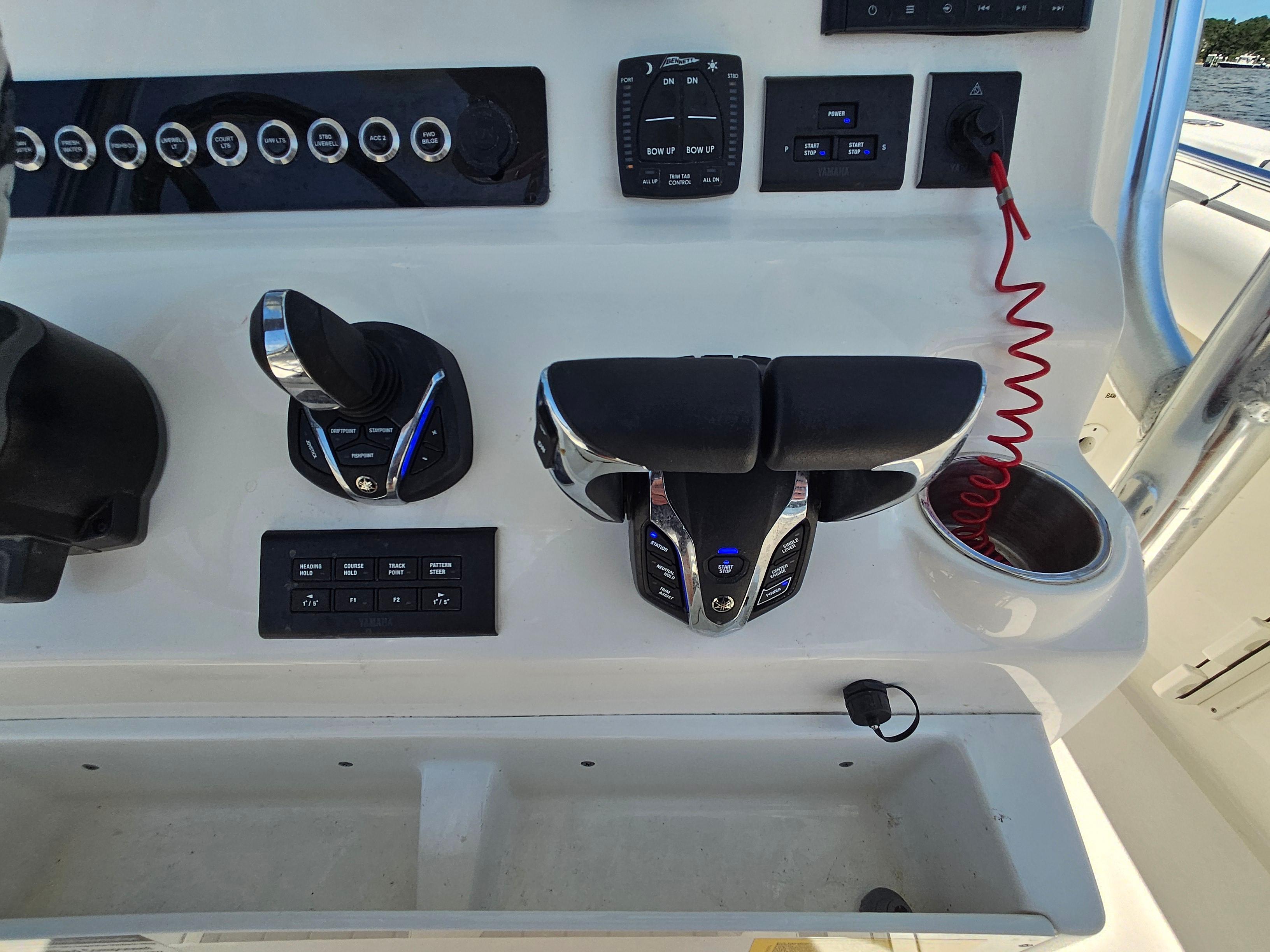 2024 Key West 244 Center Console boat controls and dashboard with modern features.