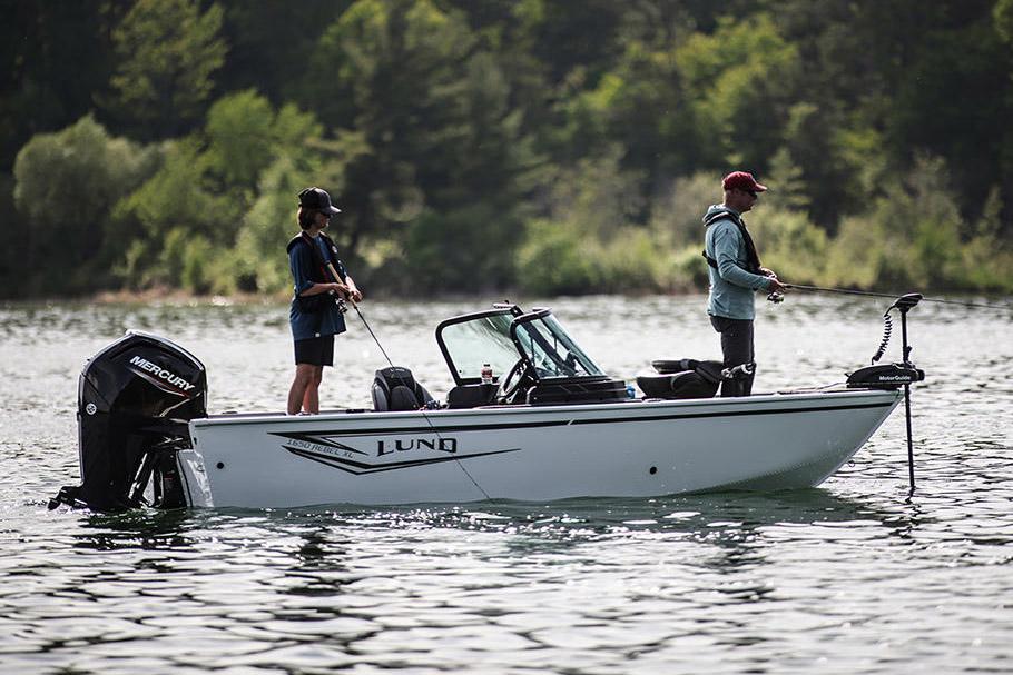 Manufacturer Provided Image: 2025 Lund 1650 Rebel XL Sport boat on a lake with two people fishing.