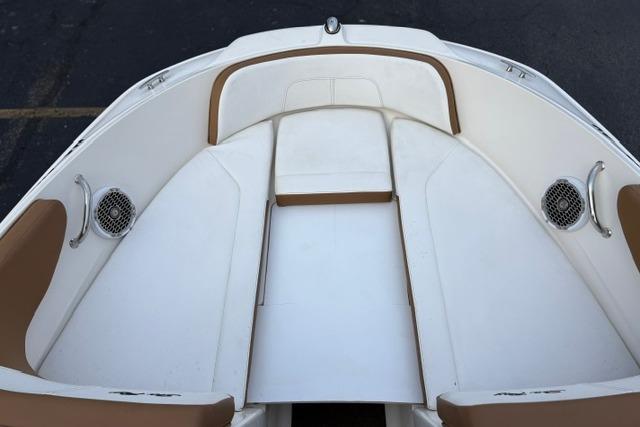 2017 Searay SPX210 boat interior with white and tan seating.