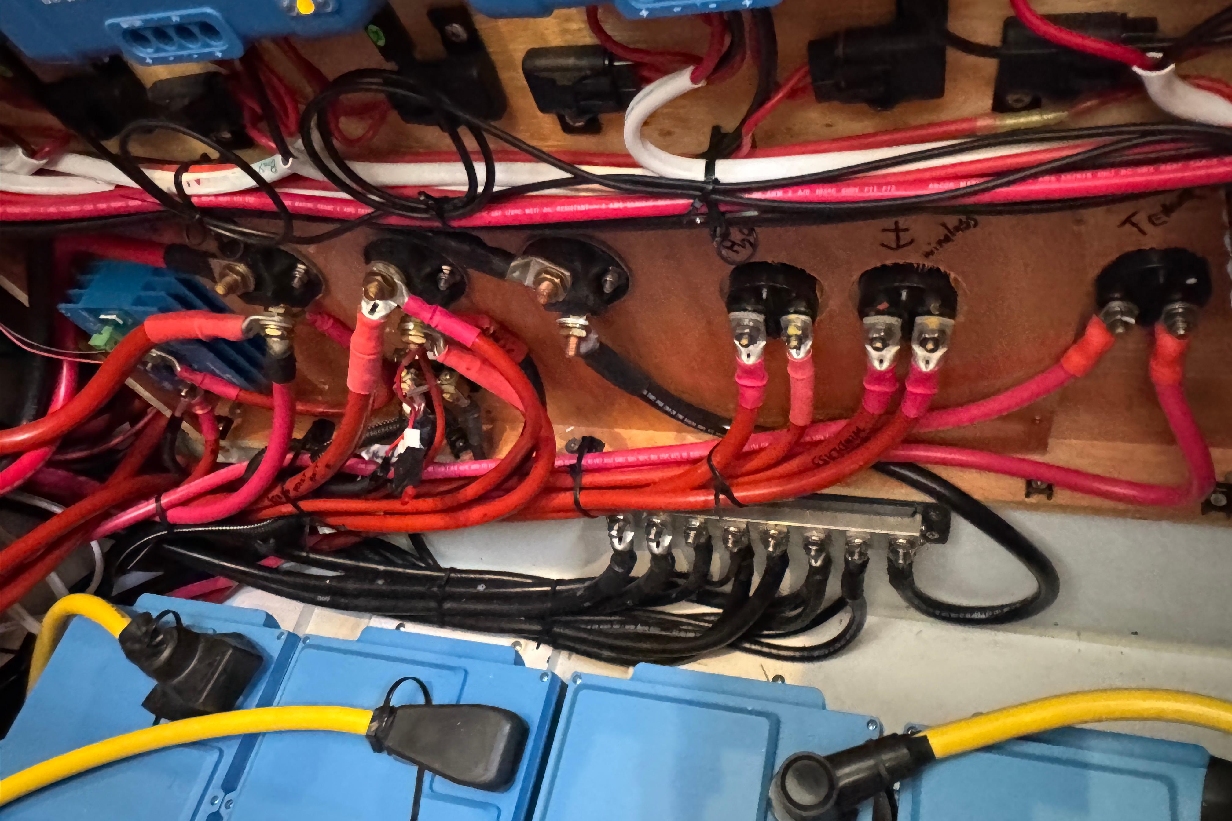 Electrical wiring system in a 2017 Lagoon 450 F yacht, showcasing cables and connections.
