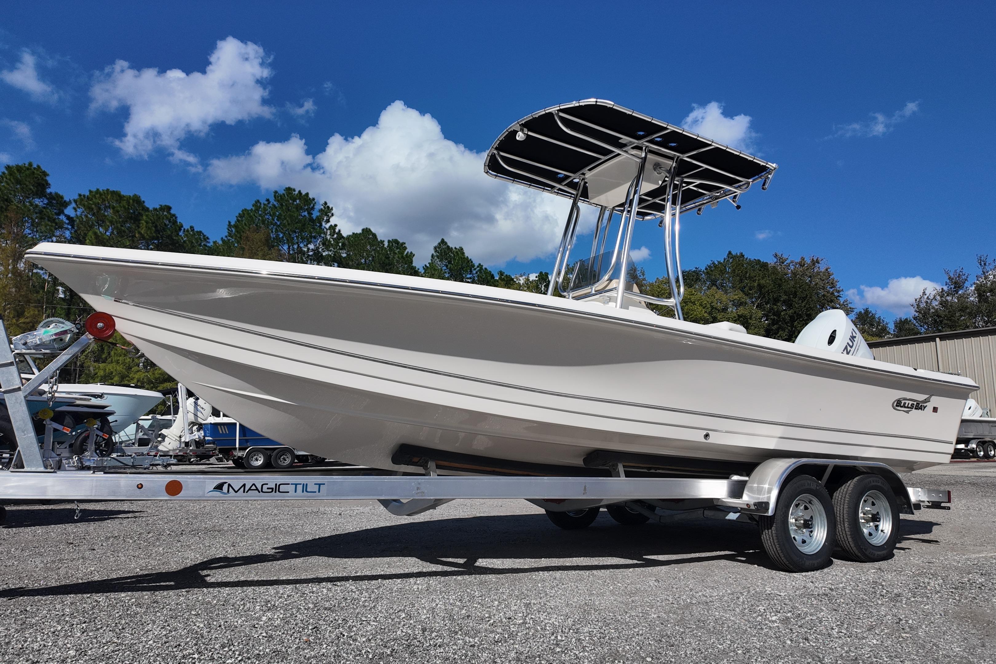 2026 Bulls Bay 2200 boat on trailer under clear blue sky.