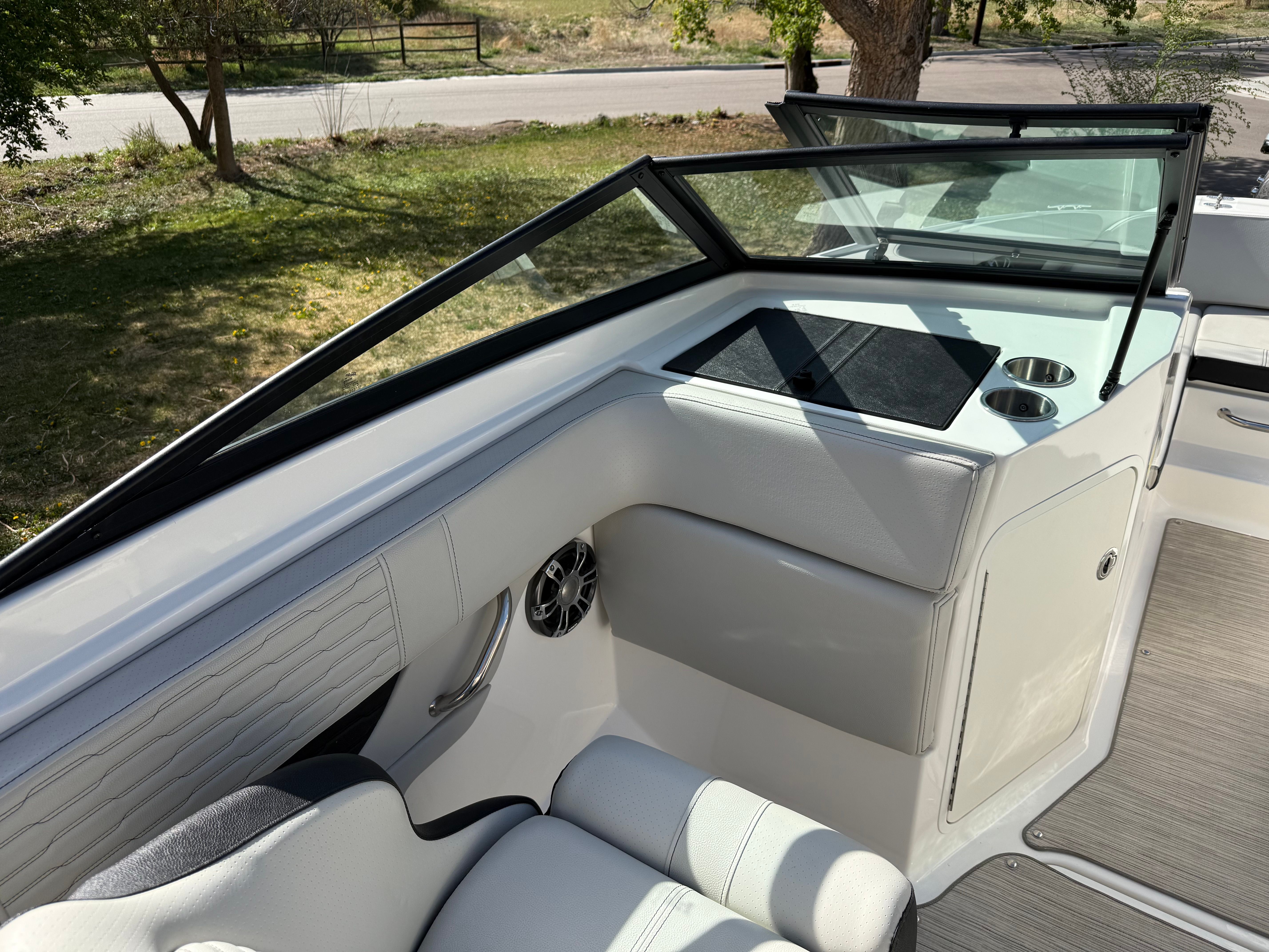 Interior of 2022 Sea Ray SPX 210 with sleek seating.