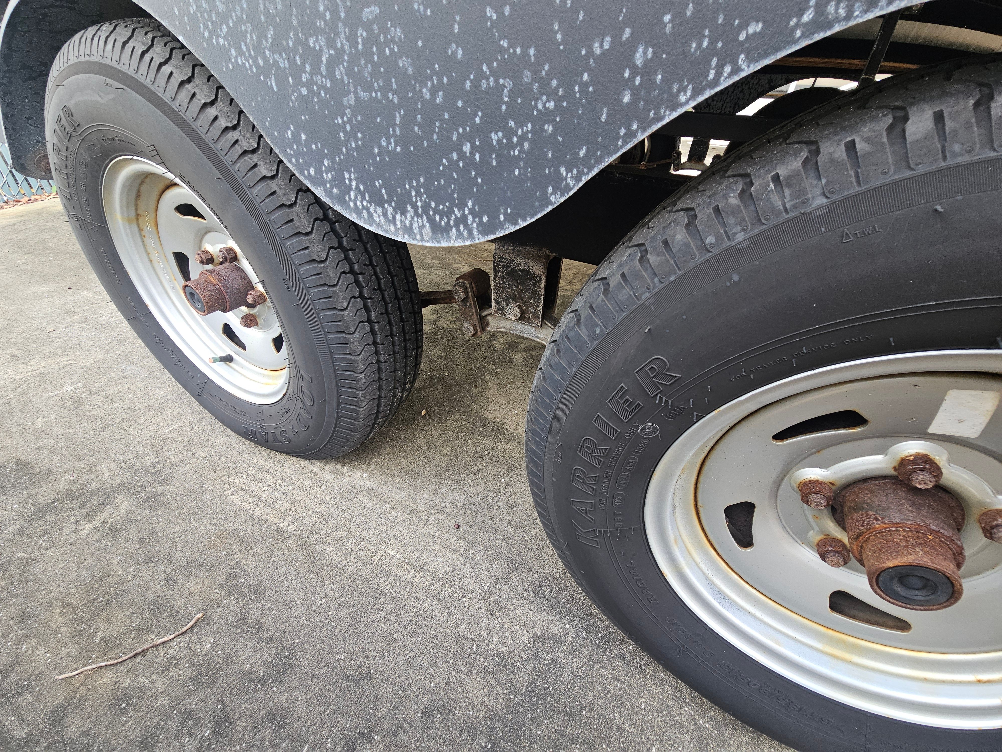 Close-up of tires on a 2024 Sun Tracker Fishin' Barge 22 DLX.