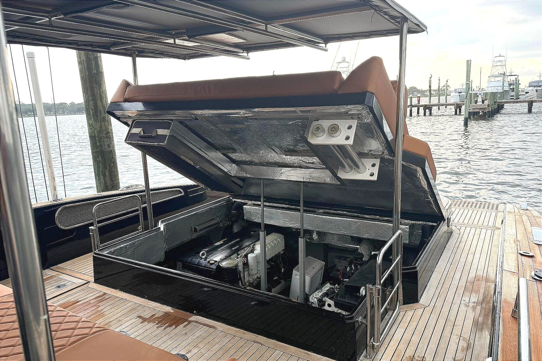 Open engine compartment of 2013 Windy SR52 yacht at dockside.