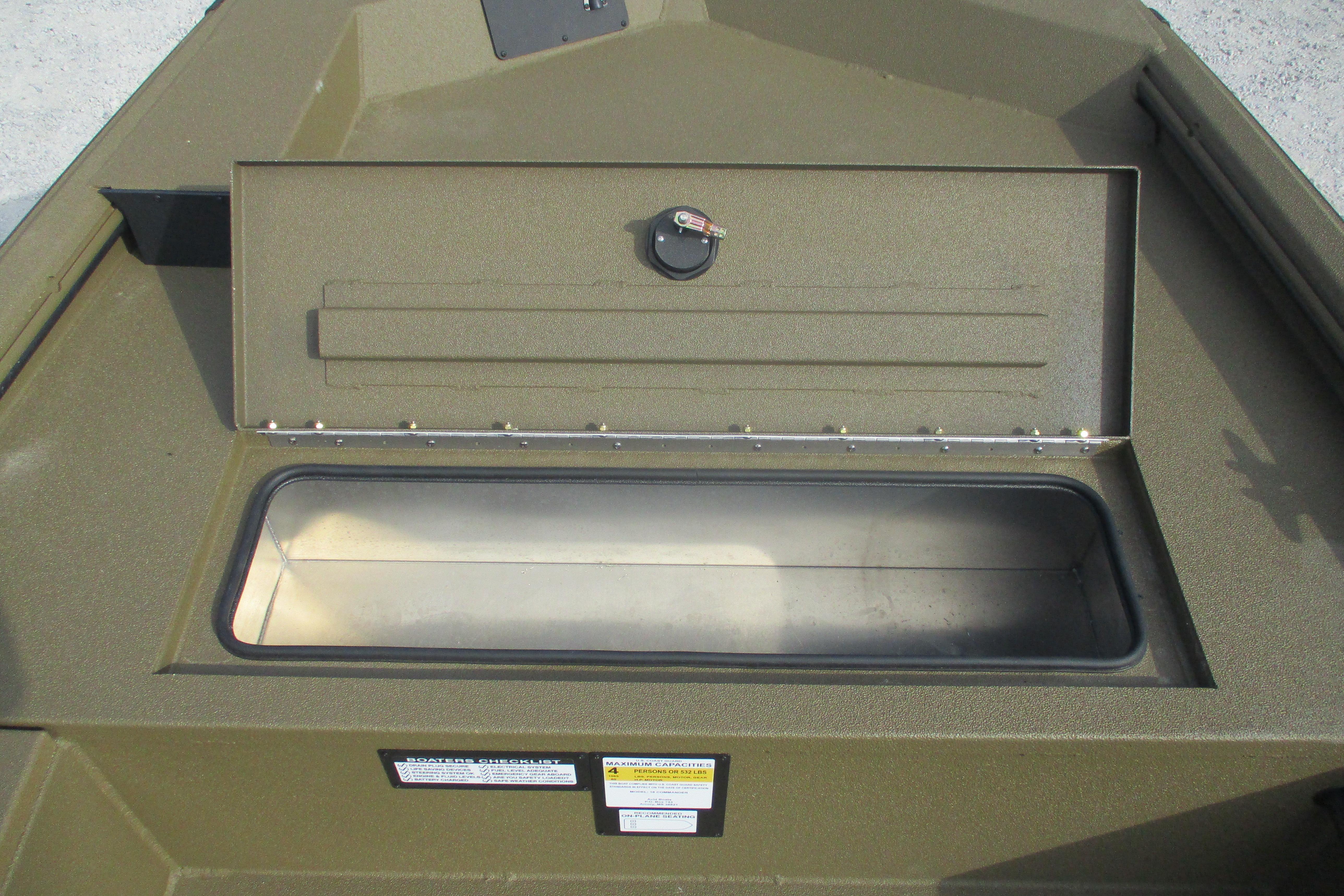 Avid 16 Commander 2026 boat storage compartment, open lid, interior view.