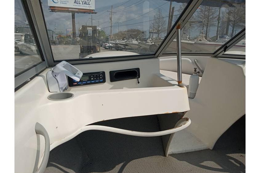 2008 Bayliner 175 boat interior with dashboard and windshield view.