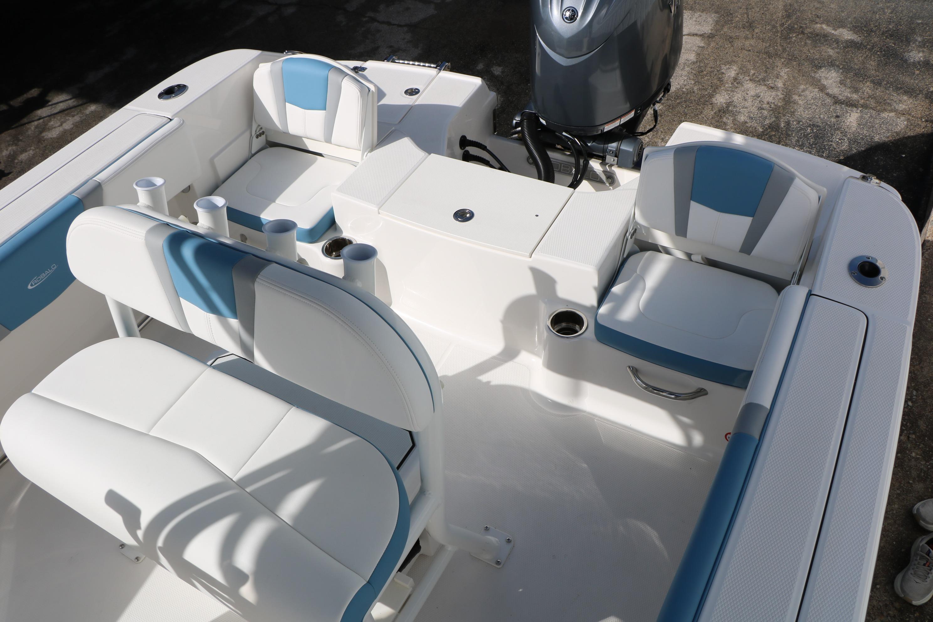 2026 Robalo R200 Center Console boat interior with white and blue seating.