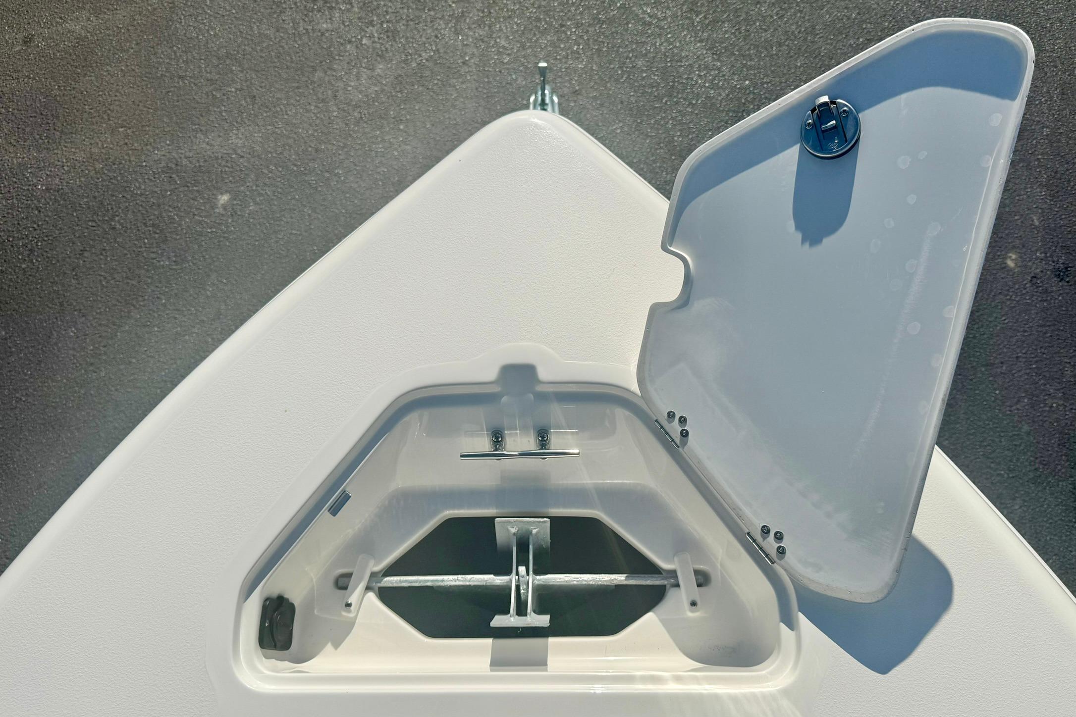 Open anchor compartment on 2026 Key West 189 FS boat, showcasing storage design.
