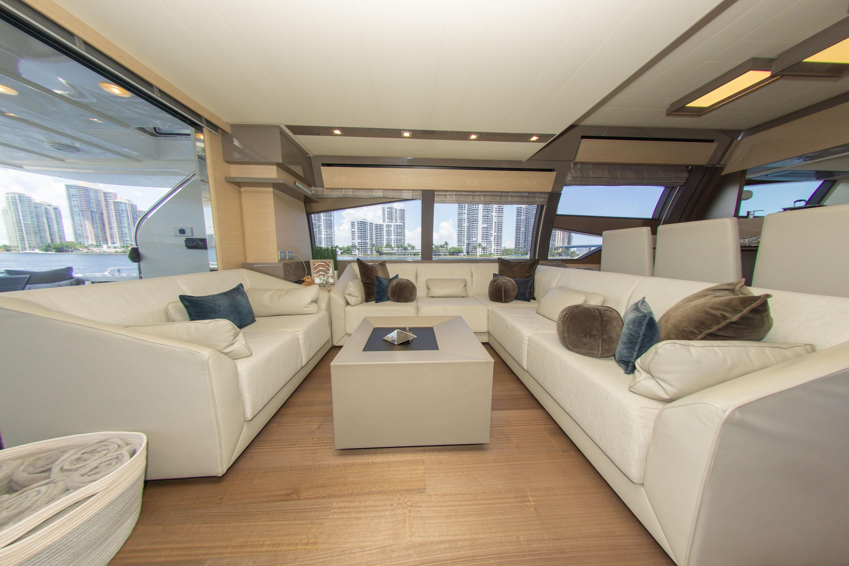 Luxurious interior of 2015 Ferretti Yachts 750 with elegant seating and modern decor.