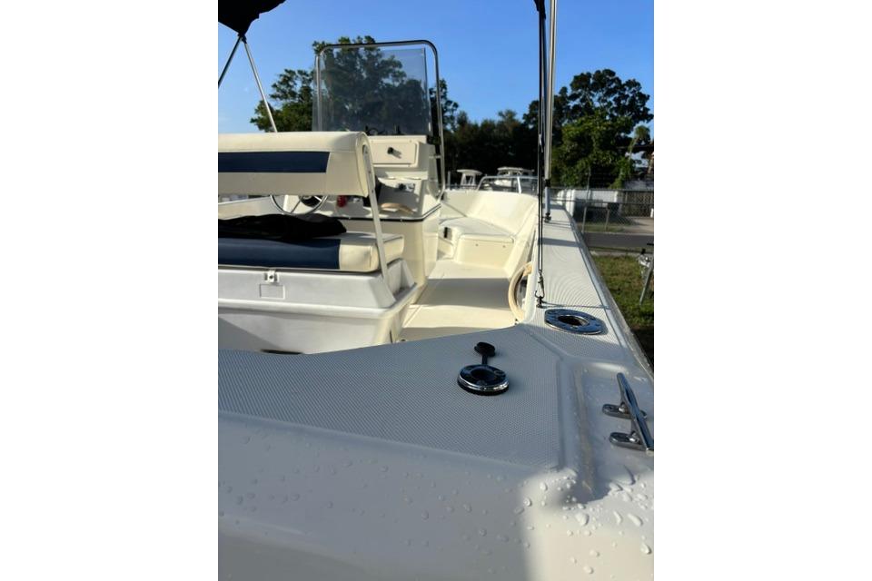 2005 Hydra-Sports Lightning 180 CC boat interior with seating and console, under clear sky.