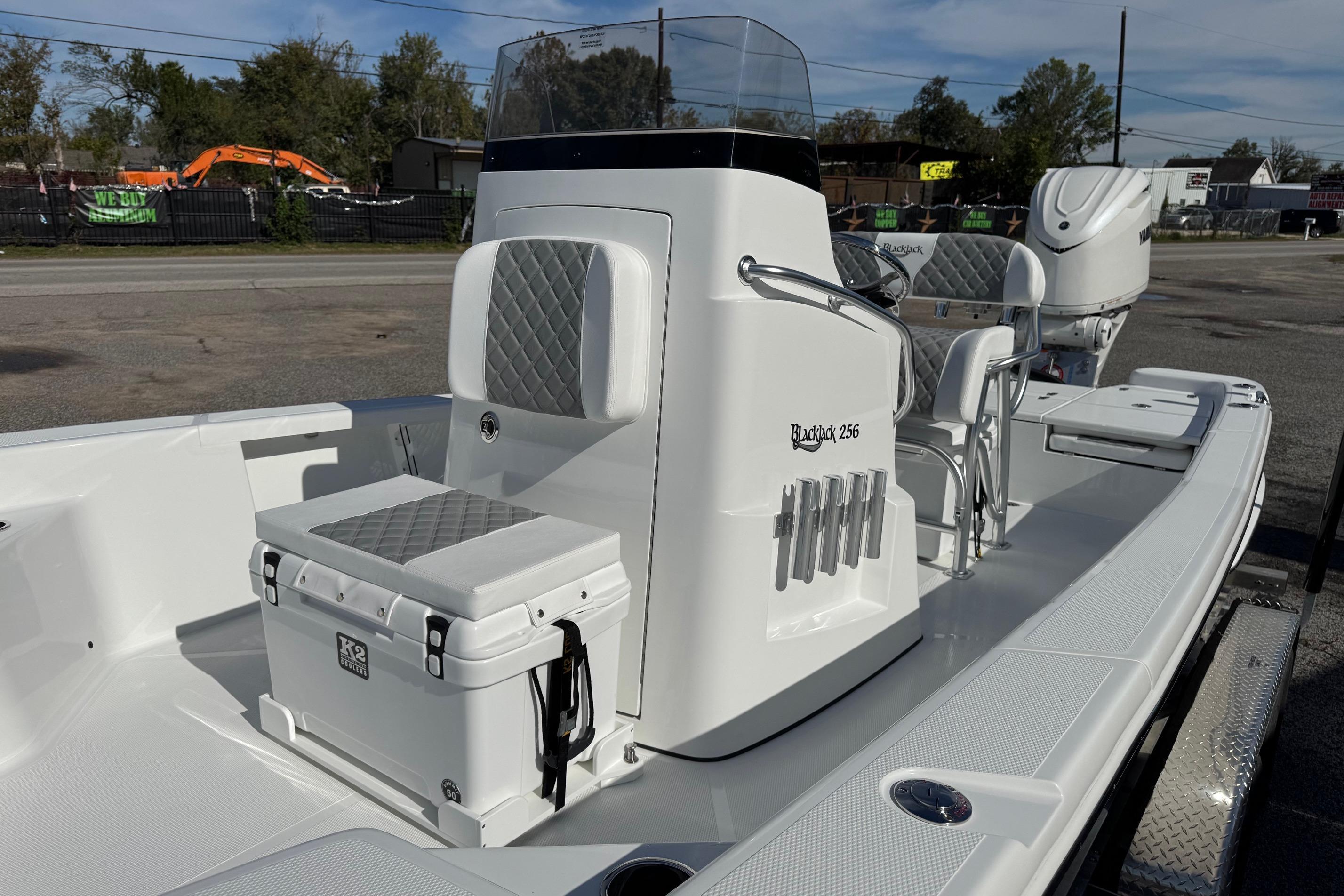 2026 BlackJack 256 Bay boat with sleek design and modern seating.