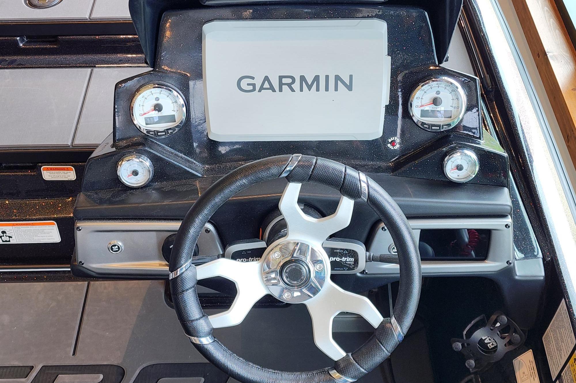 Steering console of 2026 Nitro Z20 XL boat with Garmin display and gauges.