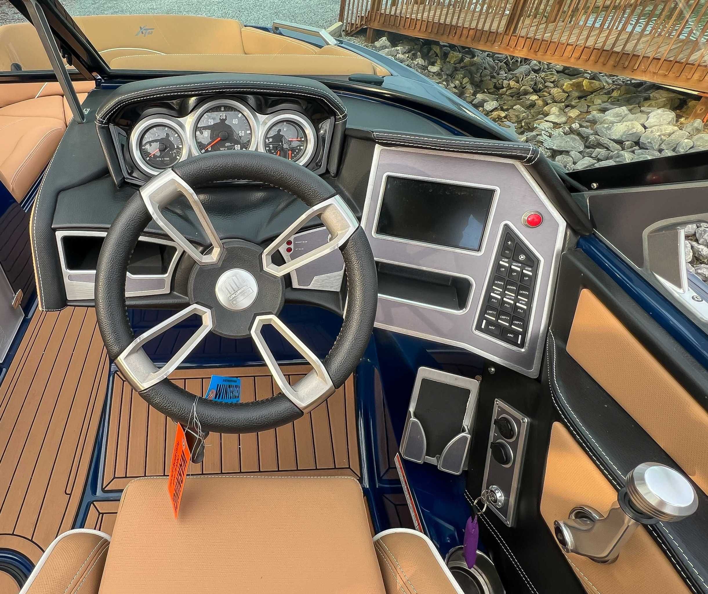 Interior view of 2021 MasterCraft XT22 boat cockpit.