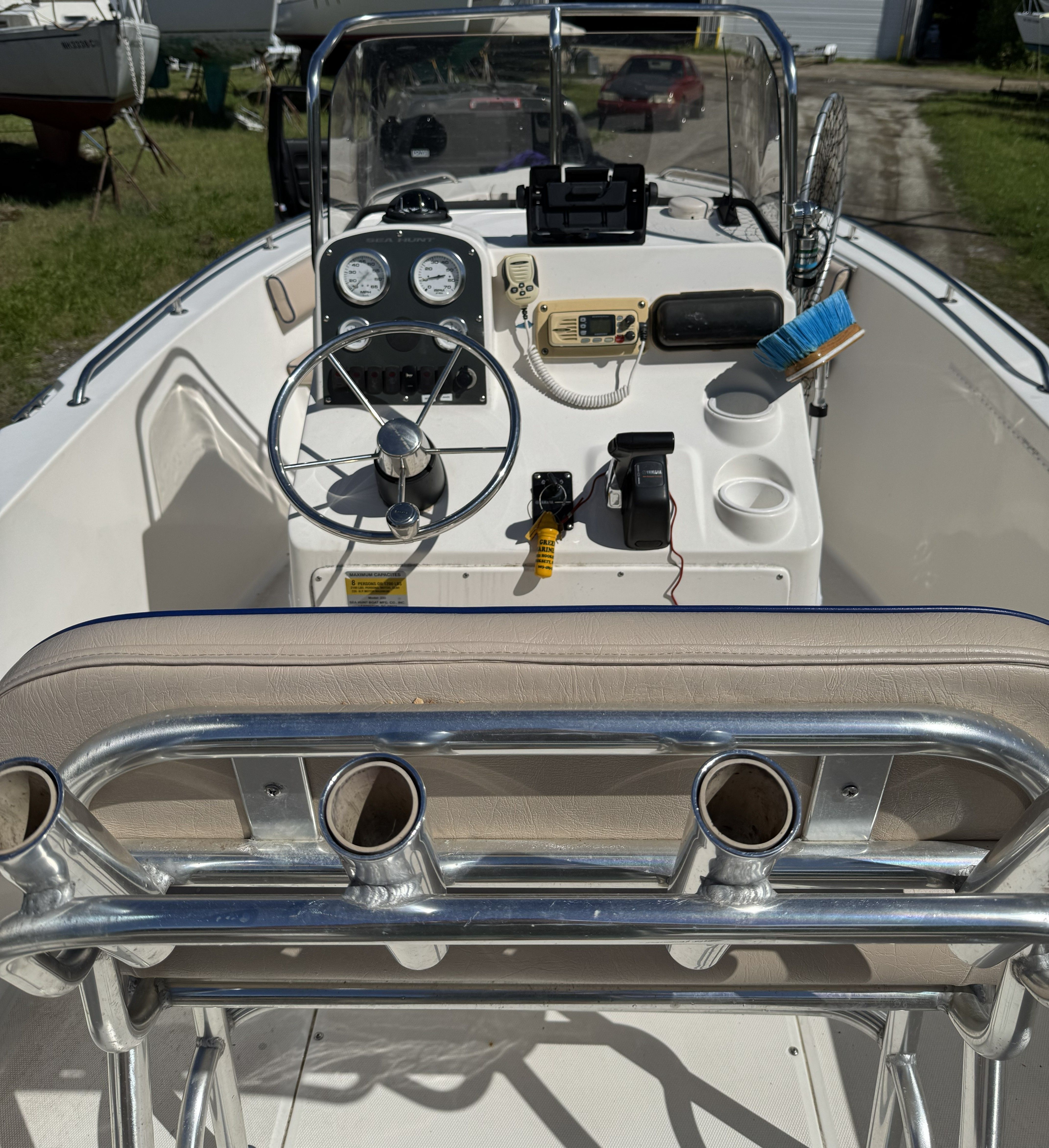 Interior view of a 2004 Sea Hunt Triton boat with control console.