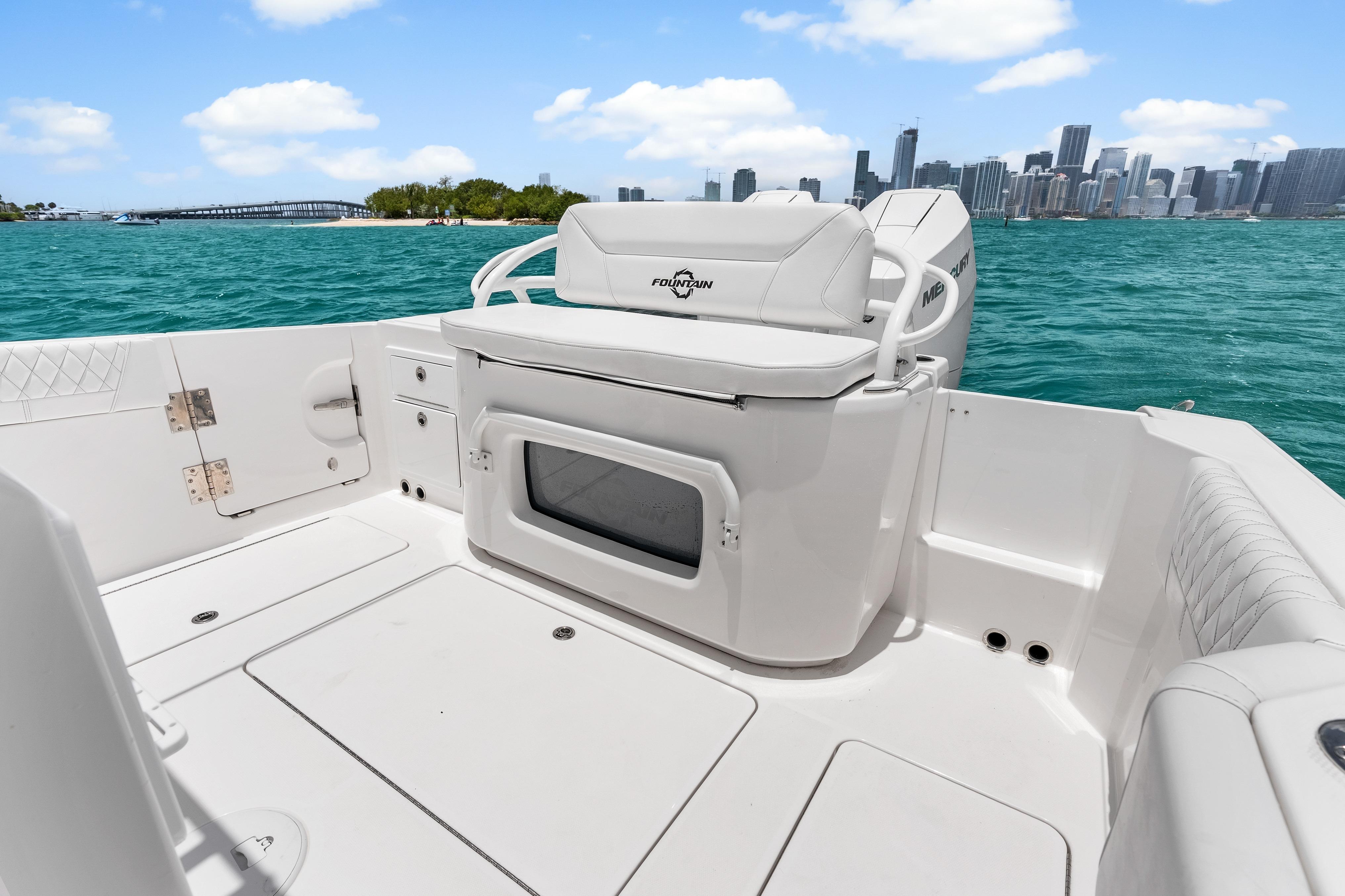 2025 Fountain 32 NX boat interior with city skyline and ocean view.