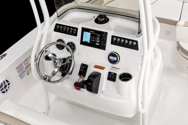 Manufacturer Provided Image: 2025 Robalo 206 Cayman boat console with steering wheel and navigation controls.