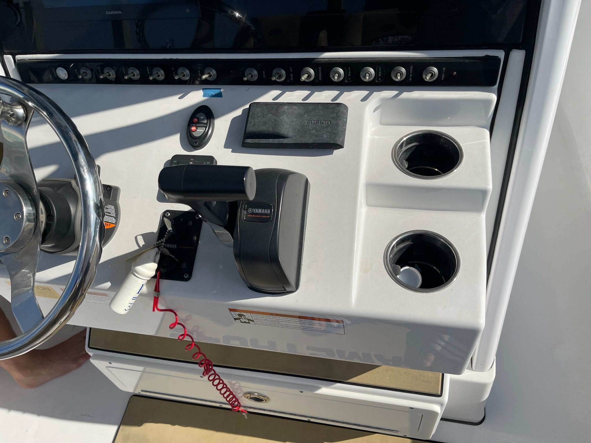 The image shows the helm of a 2022 Sportsman Masters 247 Bay Boat.