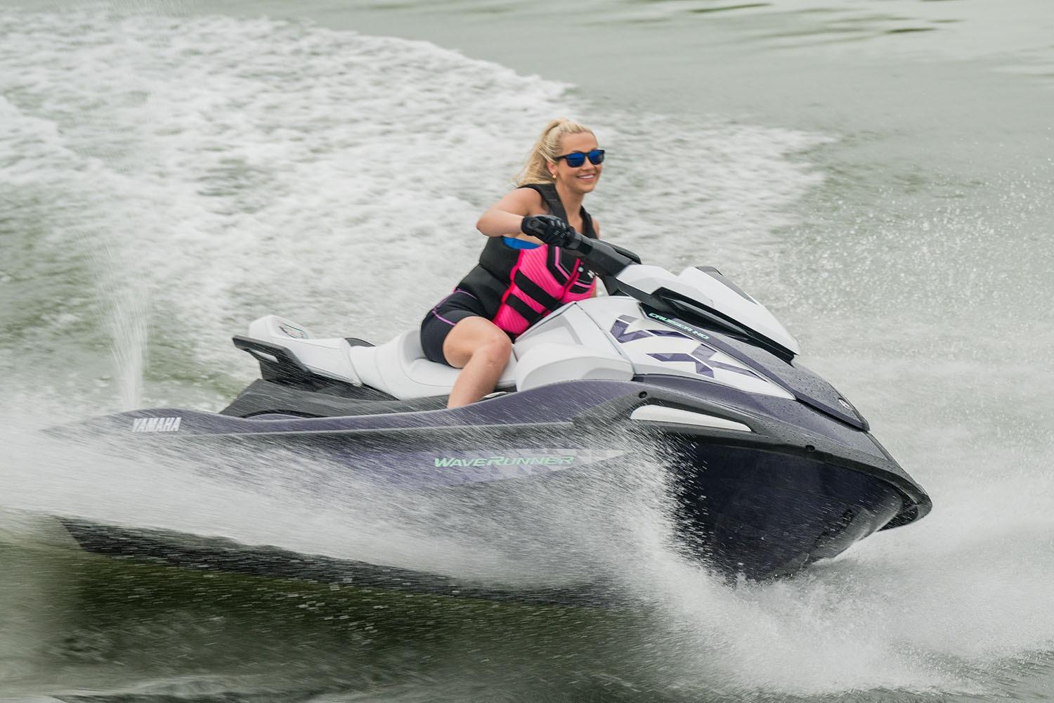 Manufacturer Provided Image: Person riding 2026 Yamaha WaveRunner VX Cruiser HO on water, wearing a pink life jacket.