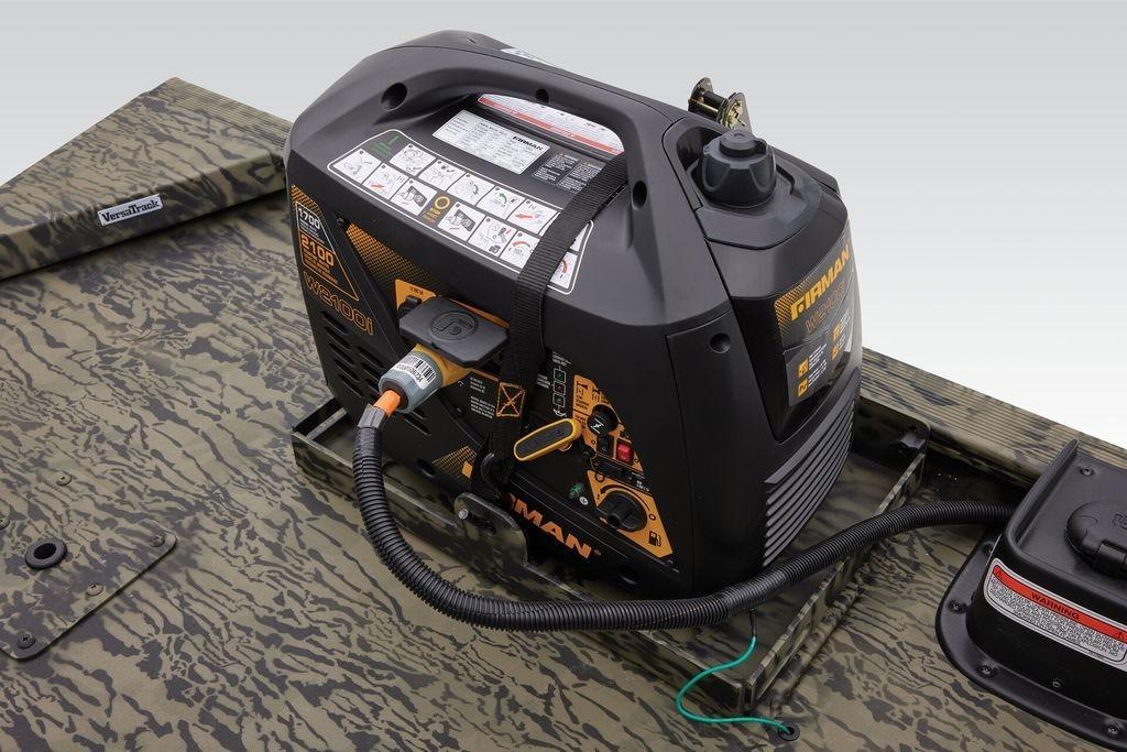 2026 Tracker GRIZZLY® 2072 CC Sportsman boat with onboard generator, camo design.
