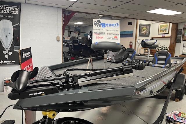 2026 Ranger RT188 fishing boat with Minn Kota trolling motor in showroom display.