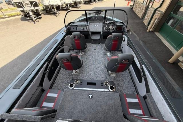 2026 Ranger VX1988 WT boat interior with seating and dashboard, parked outdoors.