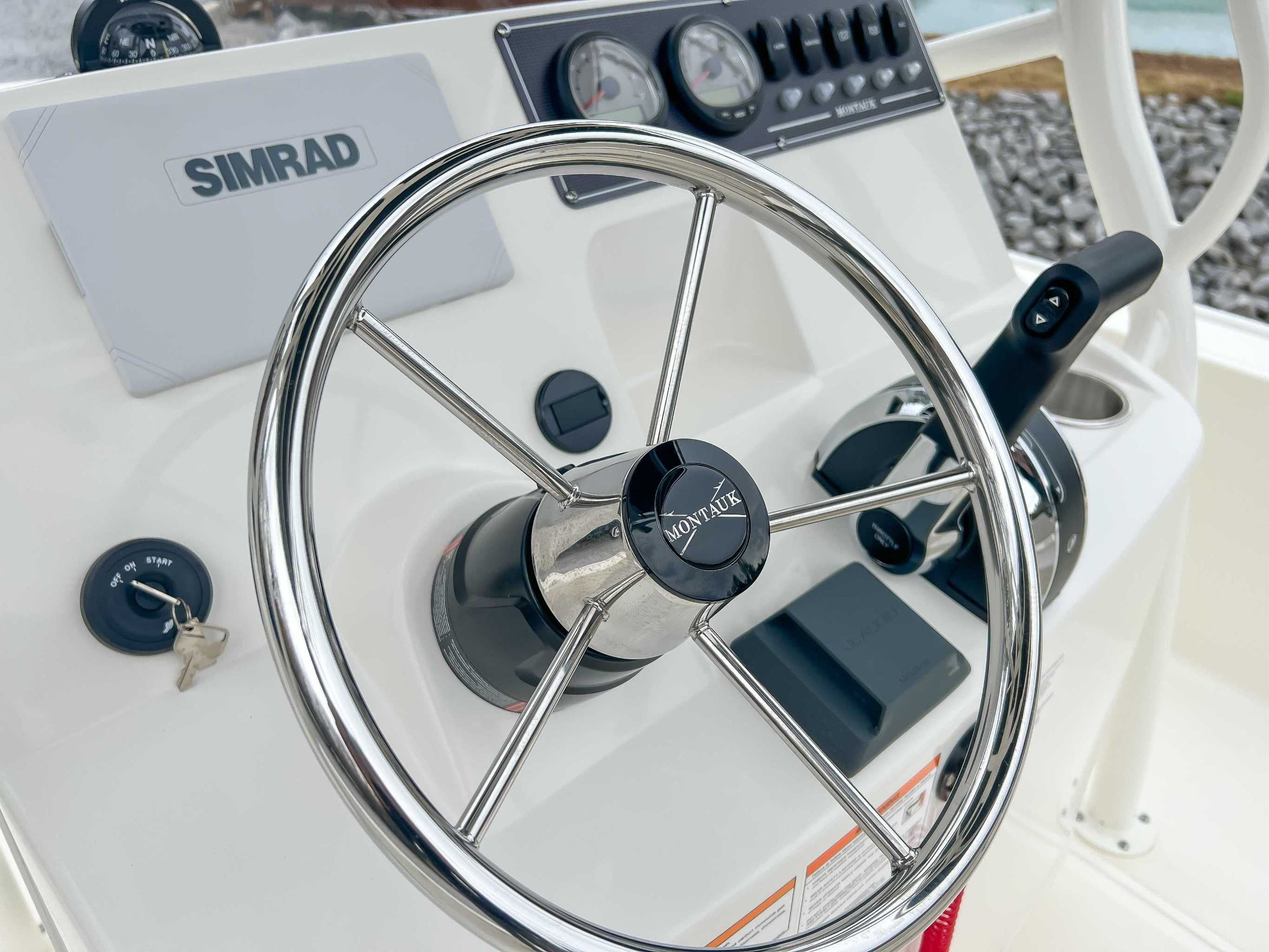 Boston Whaler 190 Montauk 2025 helm with Simrad display.