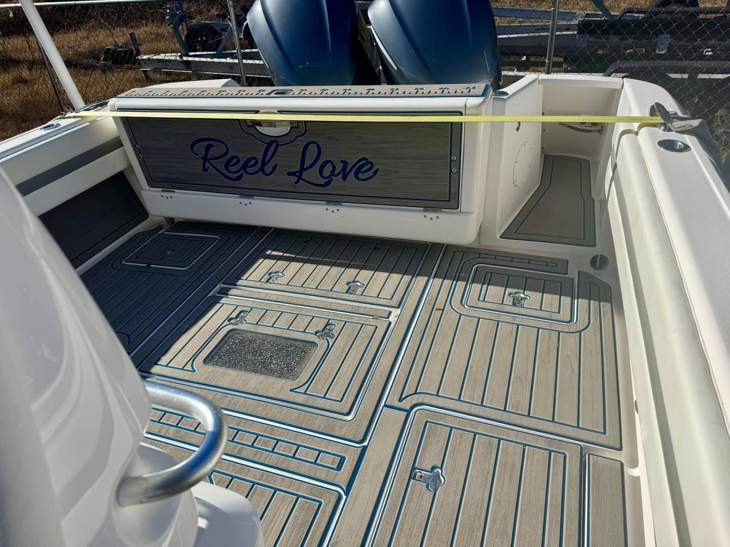 Intrepid 327 Nomad 2021 boat with custom deck design "Reel Love."