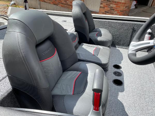2021 Tracker Pro 195 XTE boat interior with gray and red seats.