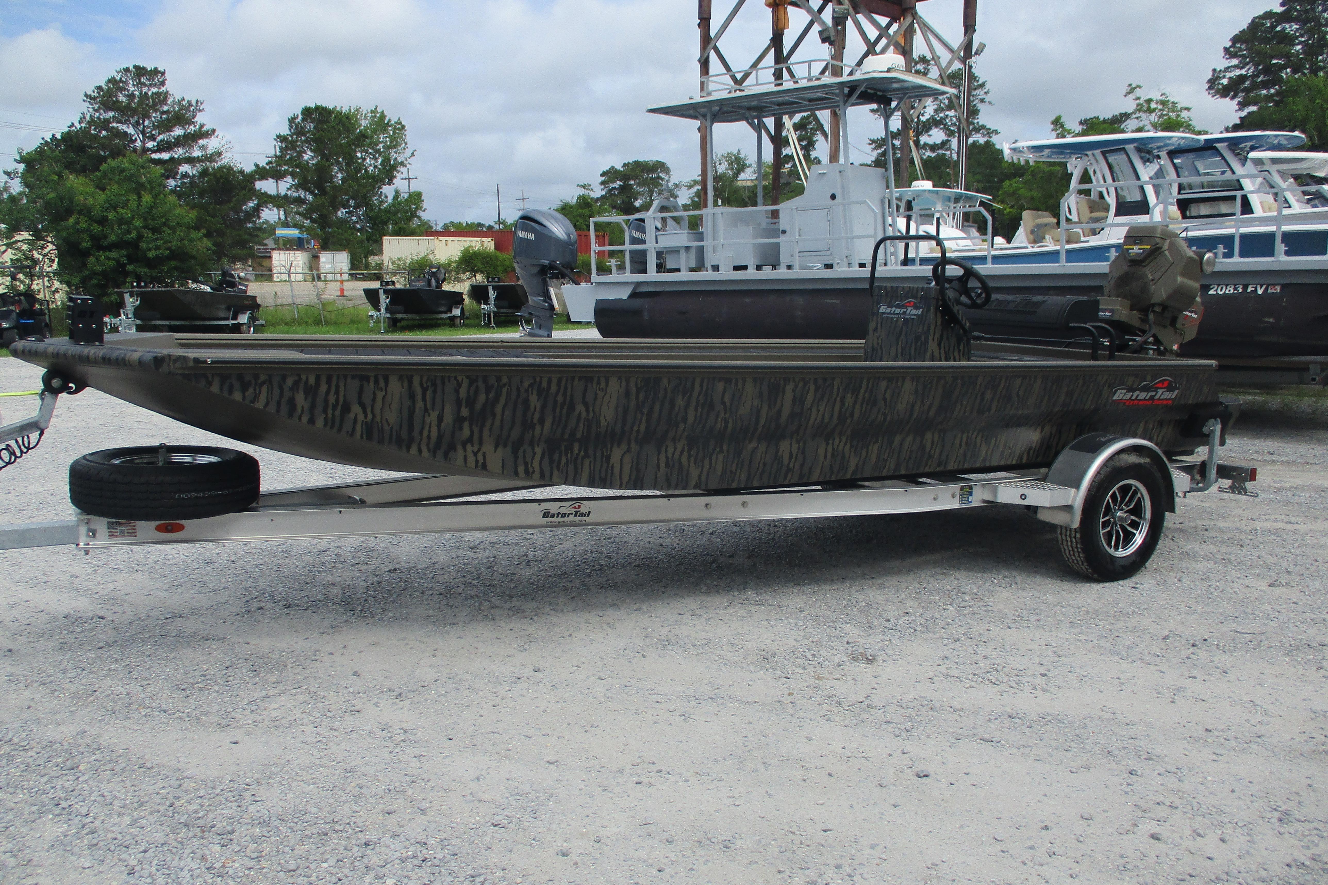 2026 Gator Tail 2060 Extreme CC boat on trailer, parked outdoors.
