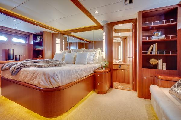 Luxurious bedroom in a 2006 Horizon 82’ Cockpit Motoryacht.