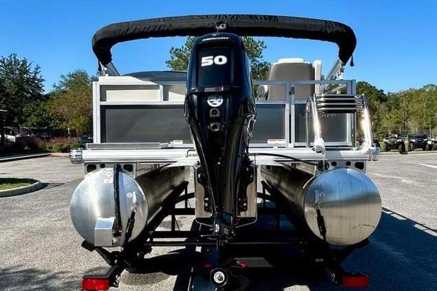 2026 Sun Tracker Bass Buggy 16 XL Select pontoon boat with 50 HP motor.