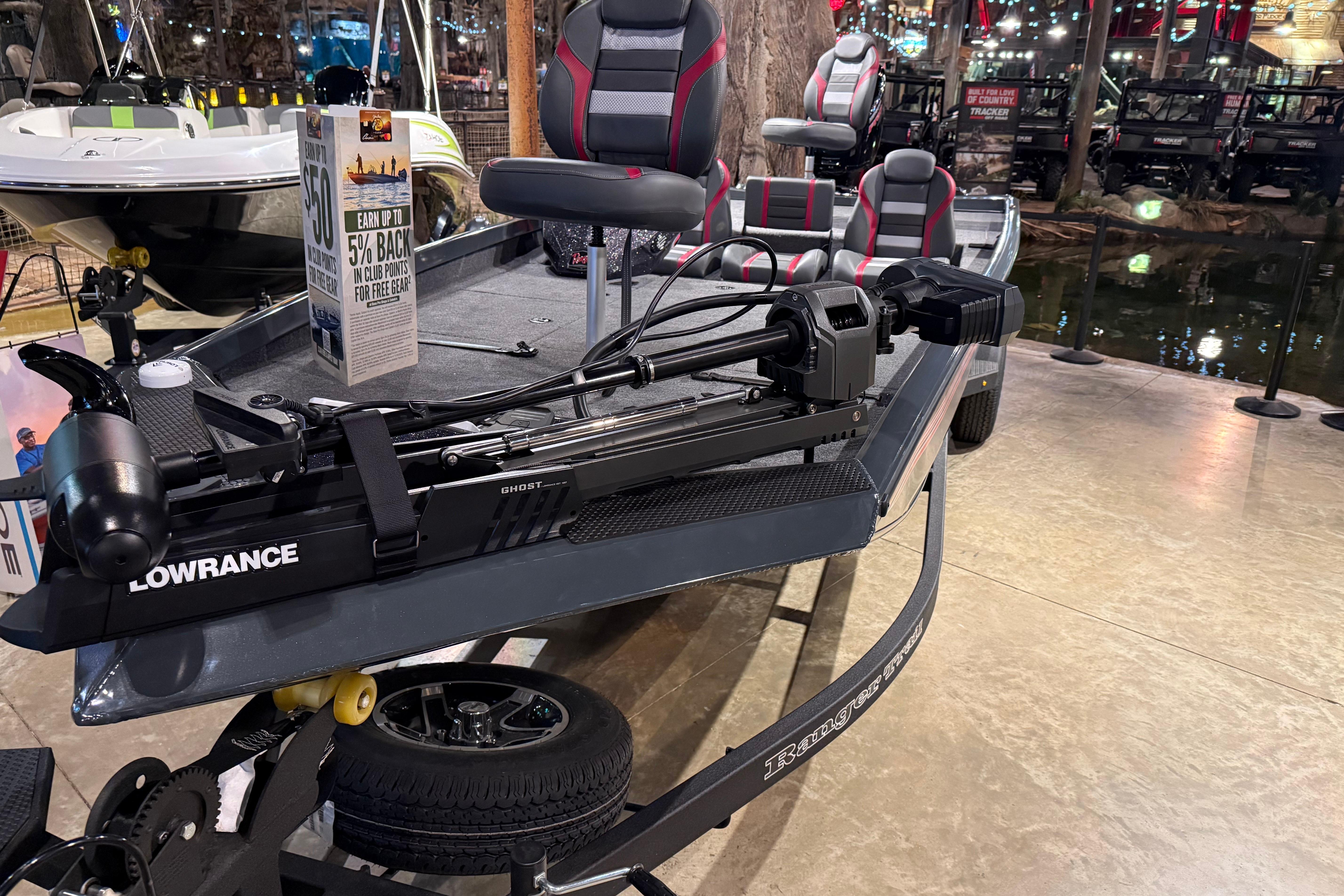 2026 Ranger RT198P fishing boat with Lowrance equipment on display indoors.