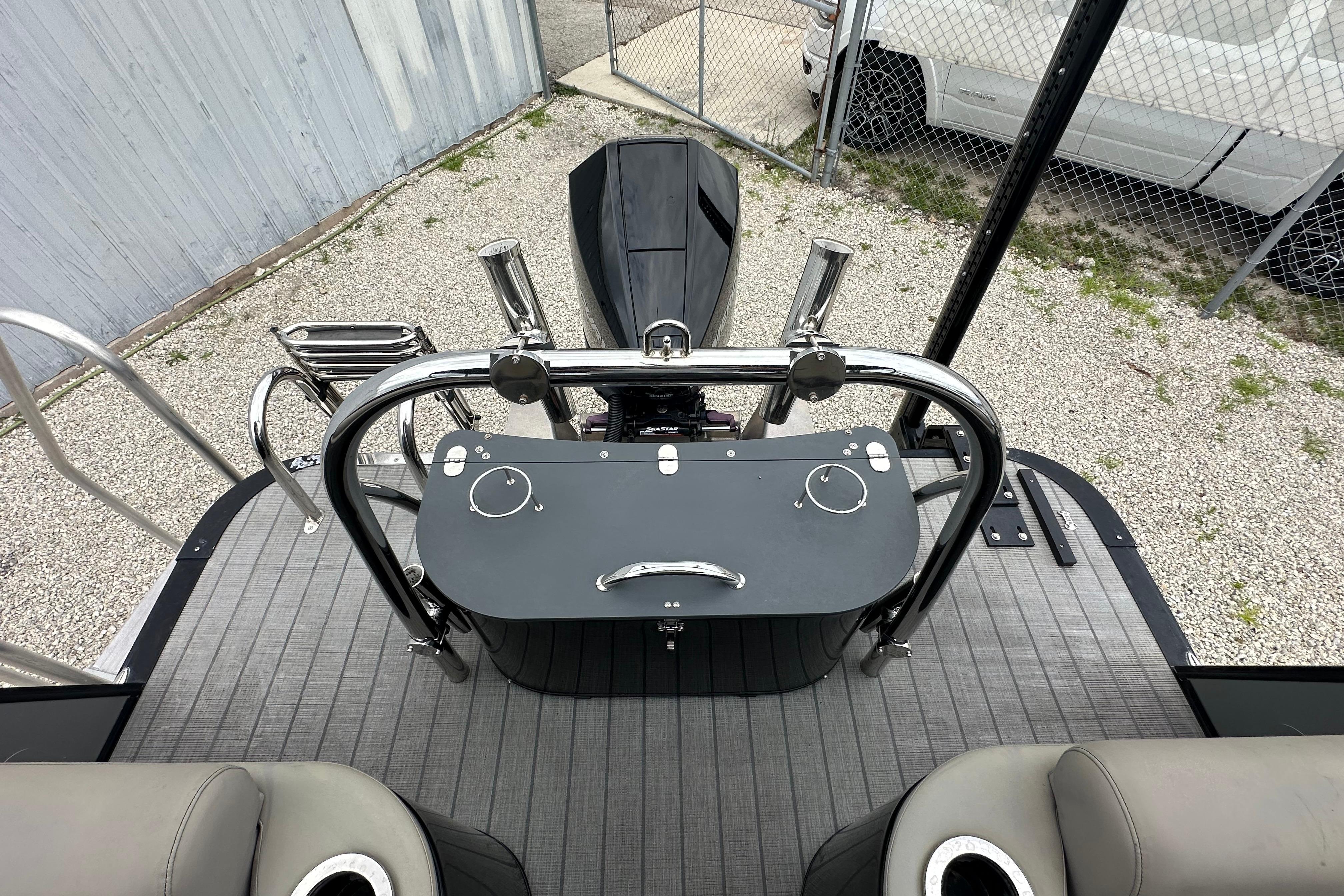 2023 Avalon Catalina Quad Lounge boat deck with seating and railing.