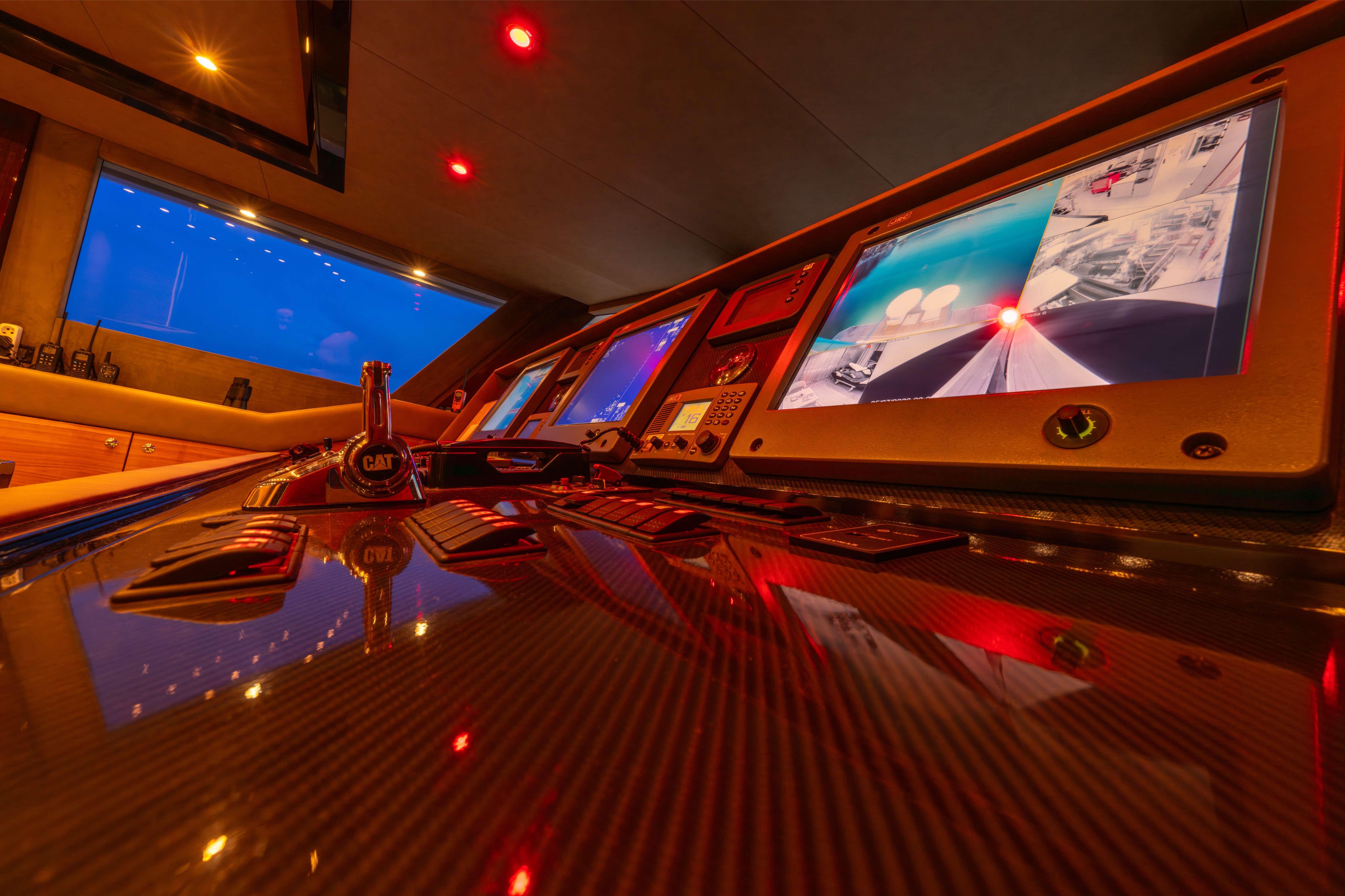 Control panel of 2014 Bilgin 147 yacht with illuminated screens and controls.