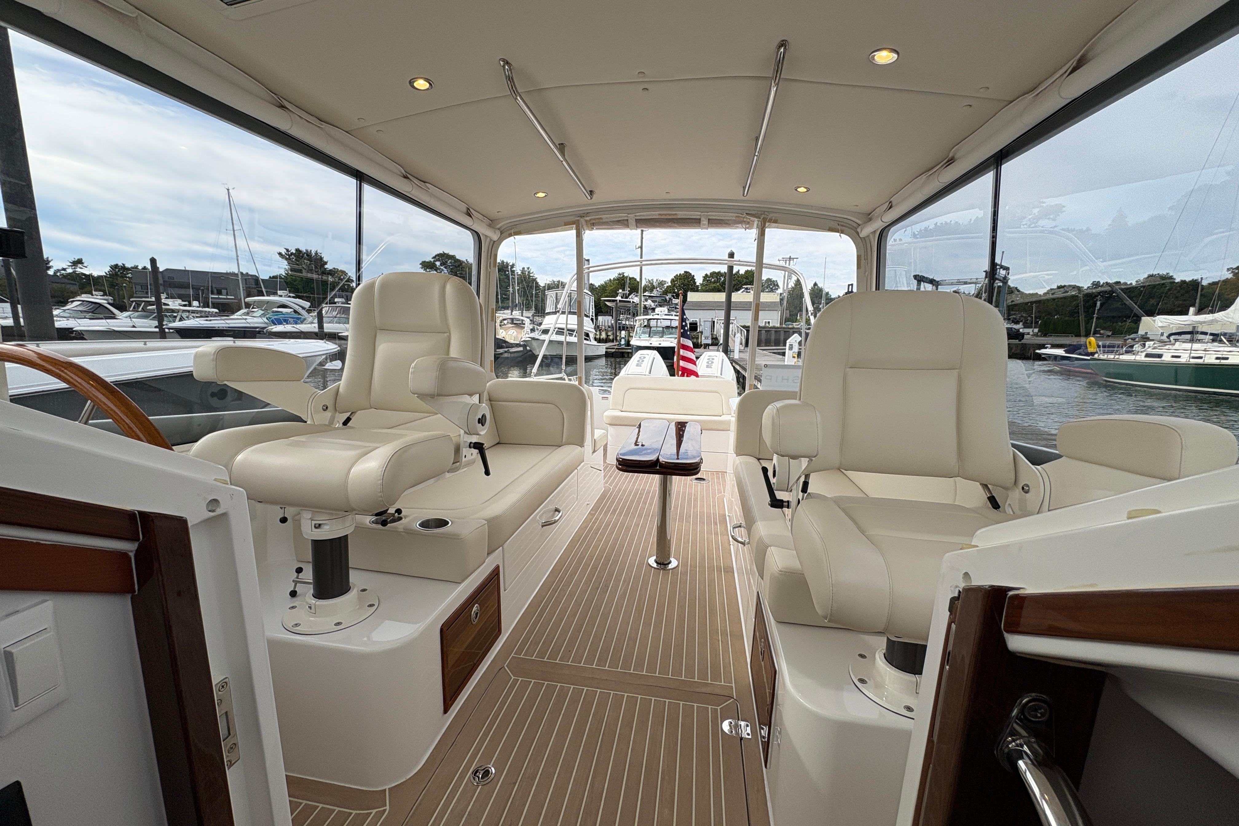 Luxurious interior of 2023 MJM 35 yacht with plush seating and elegant design.