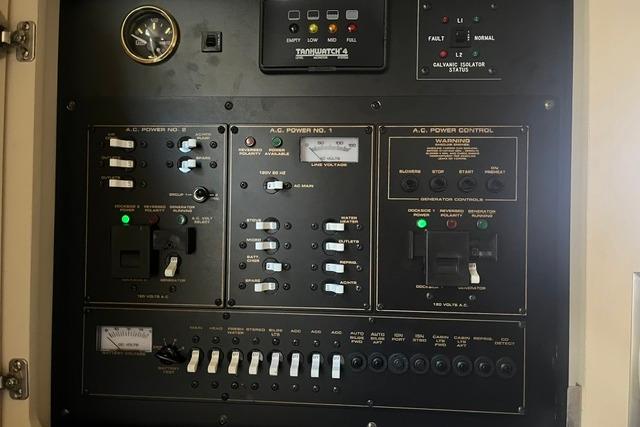 Electrical control panel of a 2004 Cruisers Yachts 3372 Express boat.