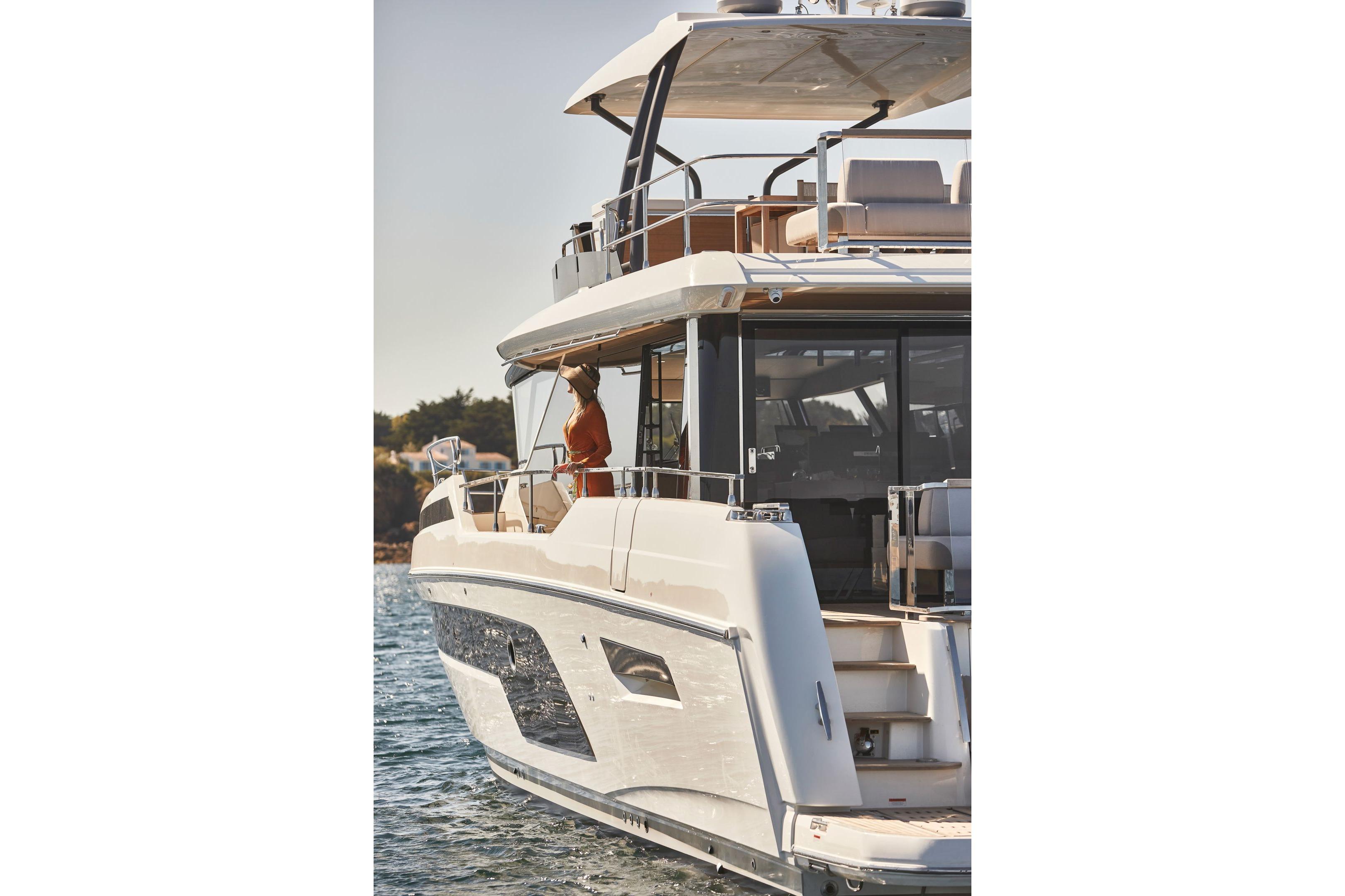 Luxury 2026 Prestige X60 yacht on water, featuring sleek design and modern amenities.