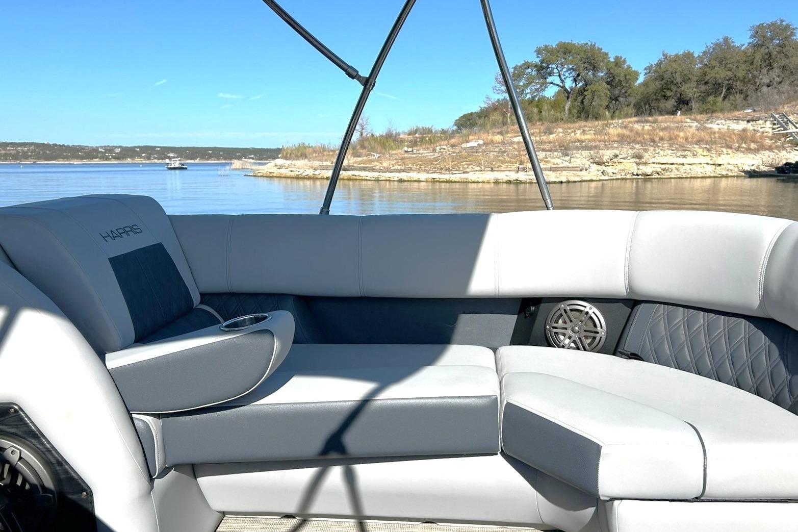2020 Harris FloteBote Solstice 230 pontoon boat interior with lake view.