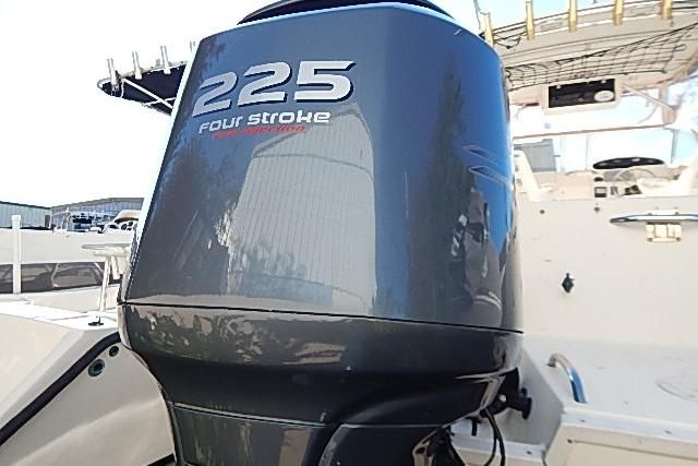 Outboard motor on 2003 World Cat 270 EC boat, featuring 225 four-stroke engine.