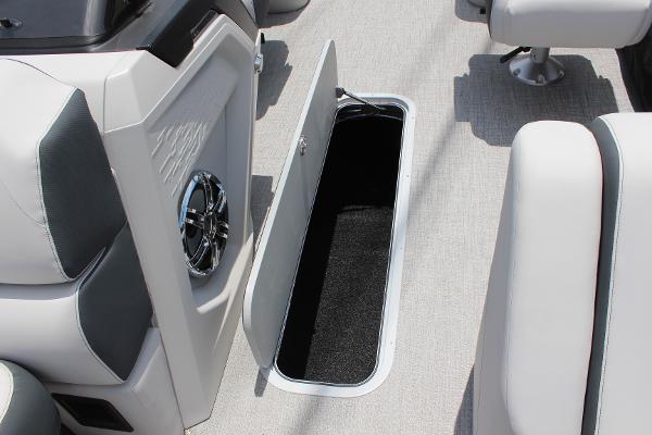 2025 Tahoe Pontoon Cascade Quad Lounger interior storage compartment open on deck.
