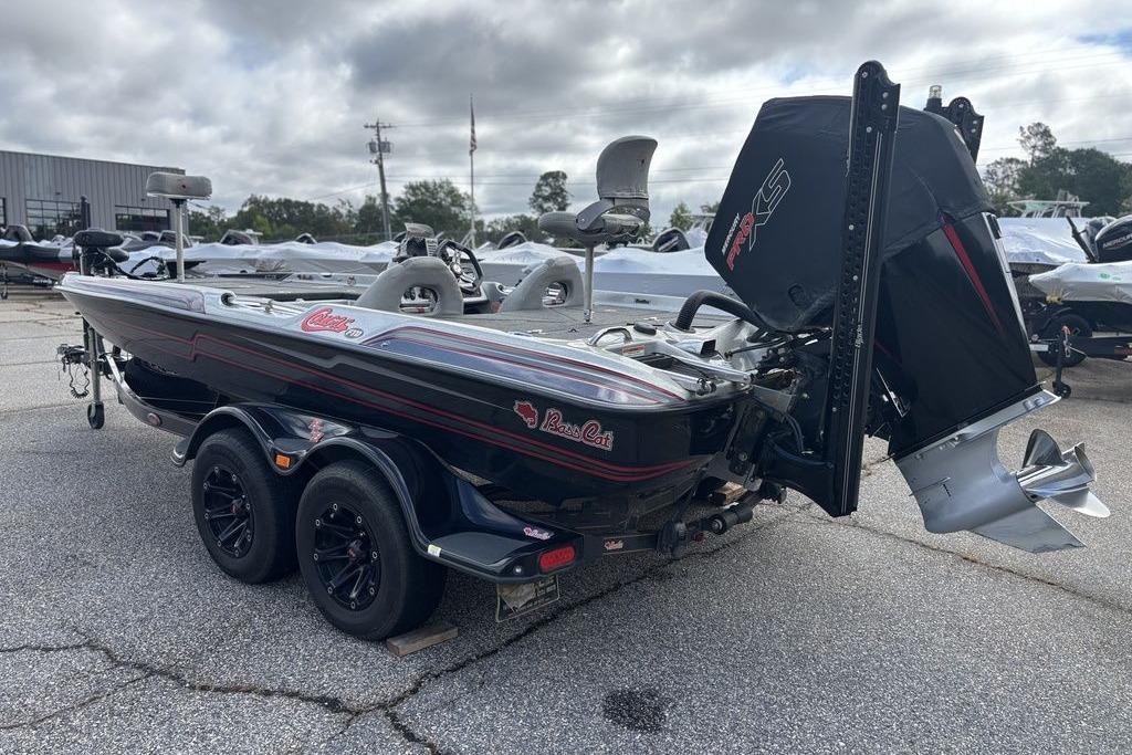 2020 Bass Cat Cougar FTD boat with dual axle trailer, parked outdoors.